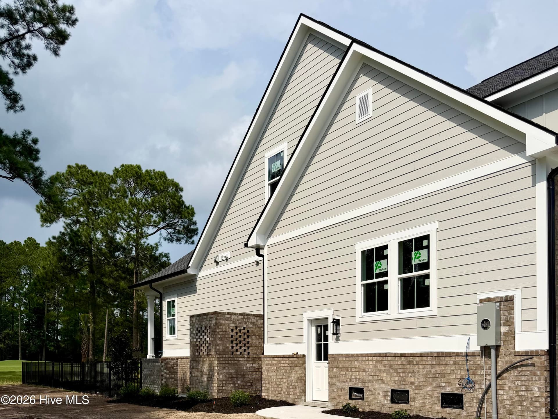 Side view, under construction. - 550 Glenburnie Street NW, Calabash, NC 28467