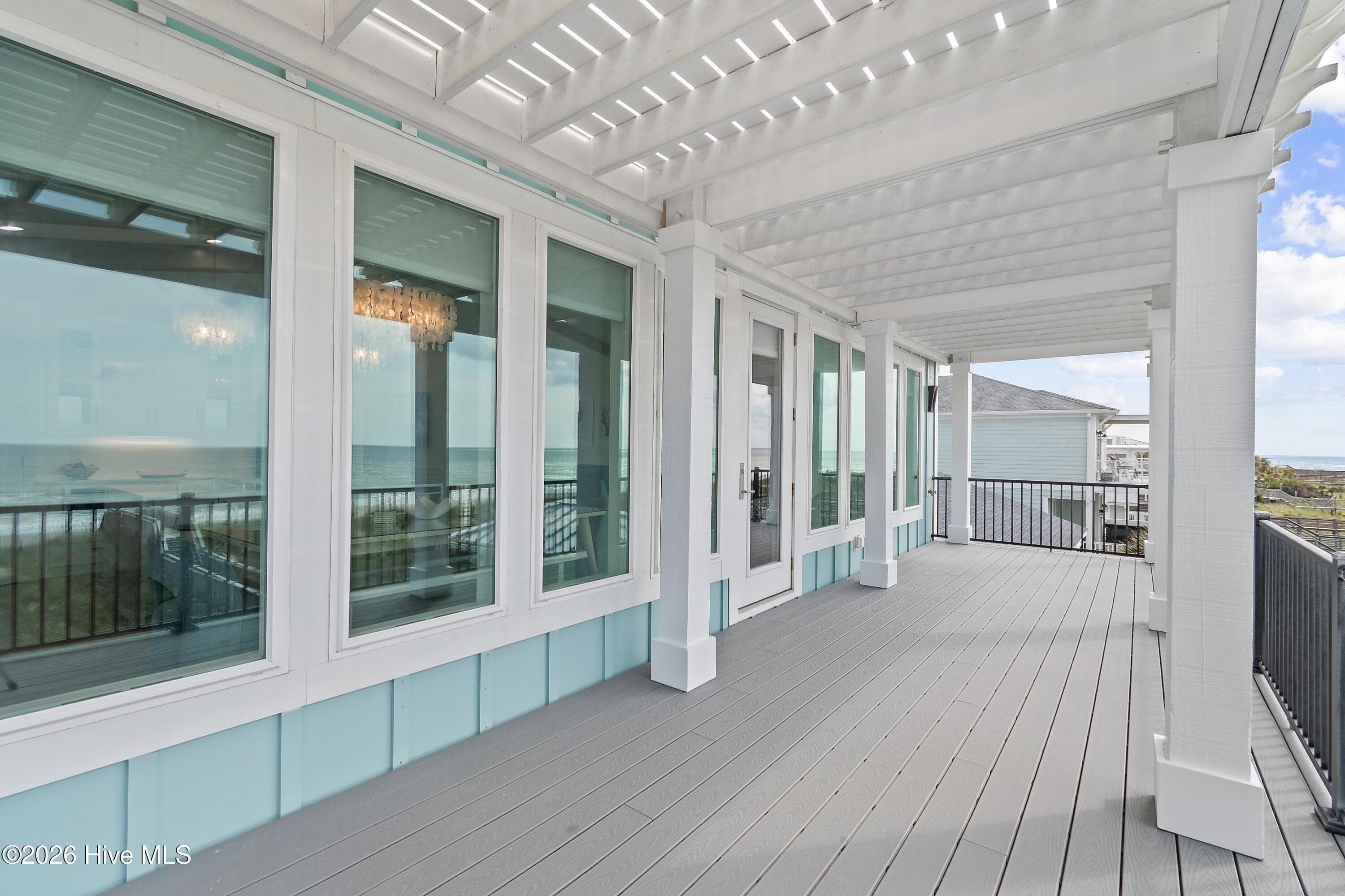 298 E First St. Second Floor Covered Balcony - 298 E First Street, Ocean Isle Beach, NC 28469