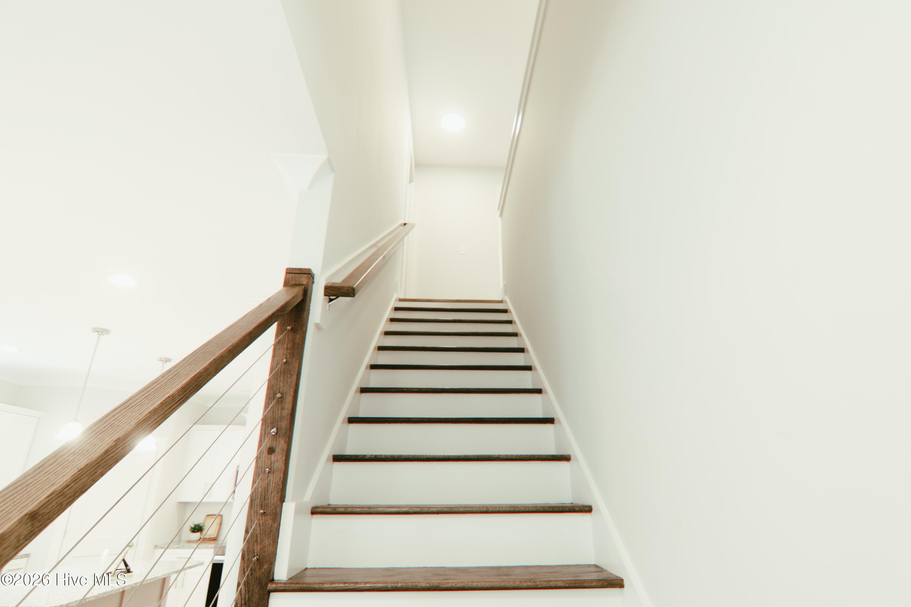 cable railing staircase with oak treads - 223 Glenwood Trail, Goldsboro, NC 27534