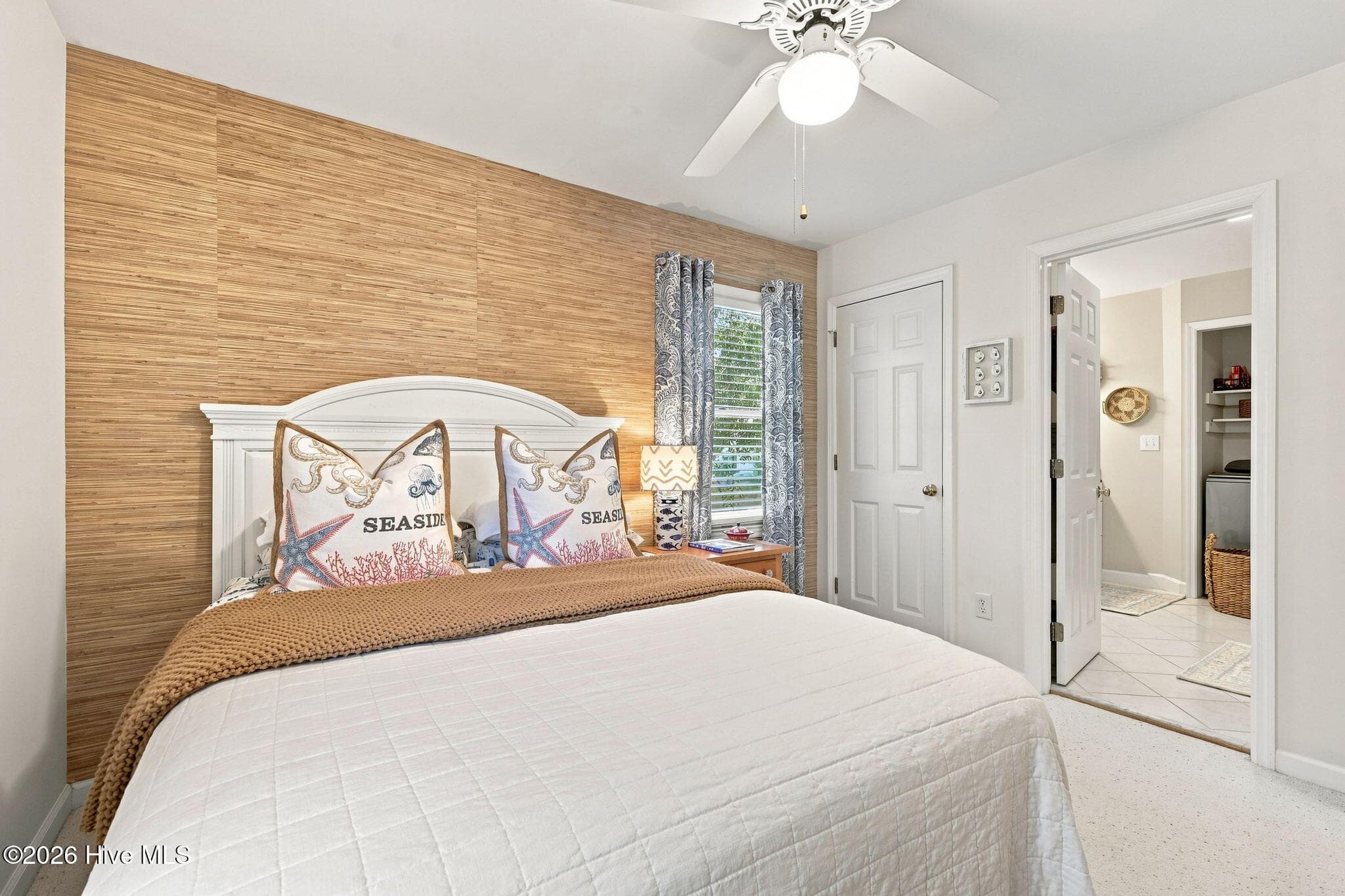 Comfortable guest bedroom with updated finishes and plenty of natural light. - 103 Georgia Street, Emerald Isle, NC 28594