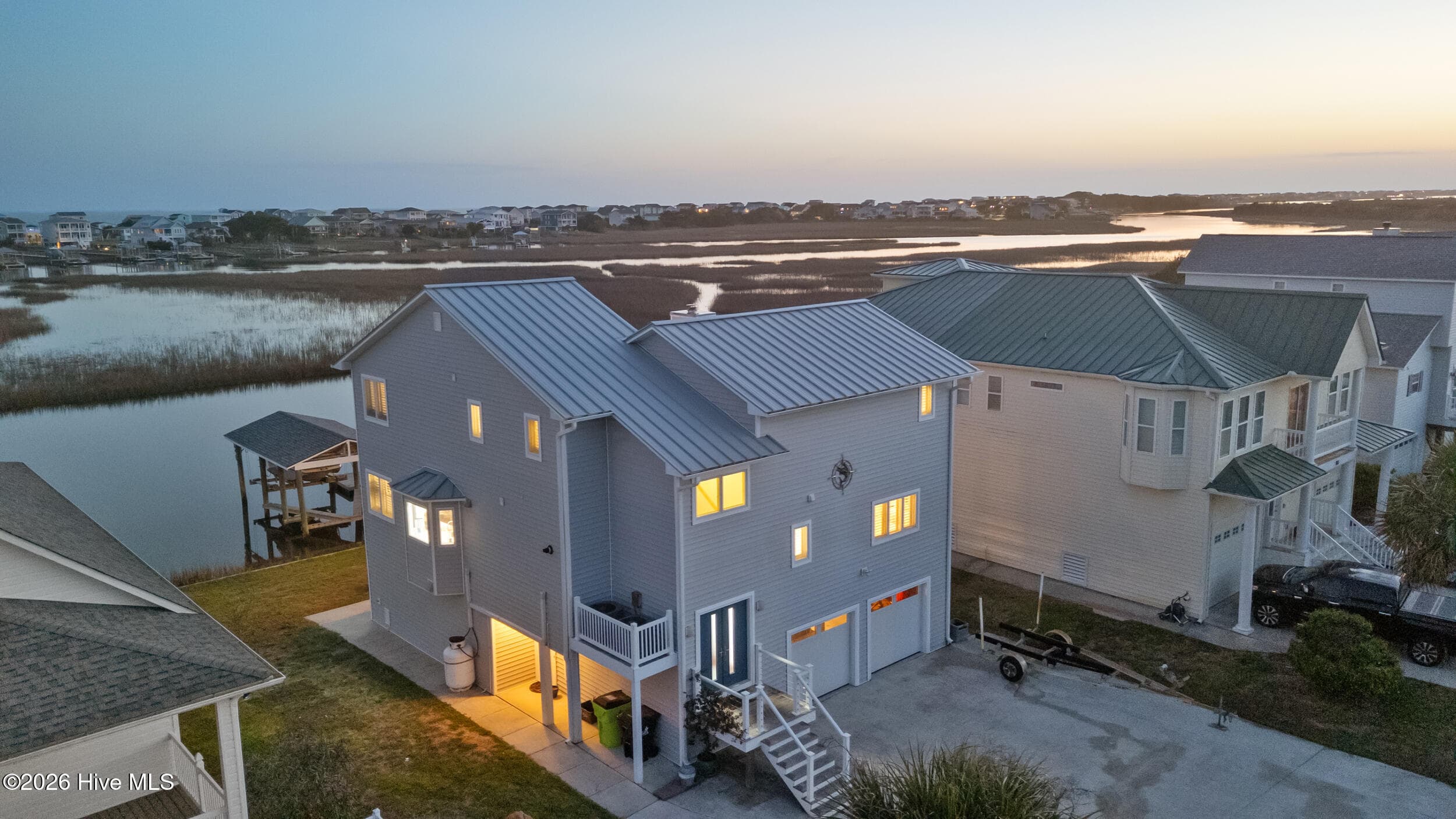 Single Family Residence at 103 E Island Drive, Oak Island, NC 28465, photo 99 of 118