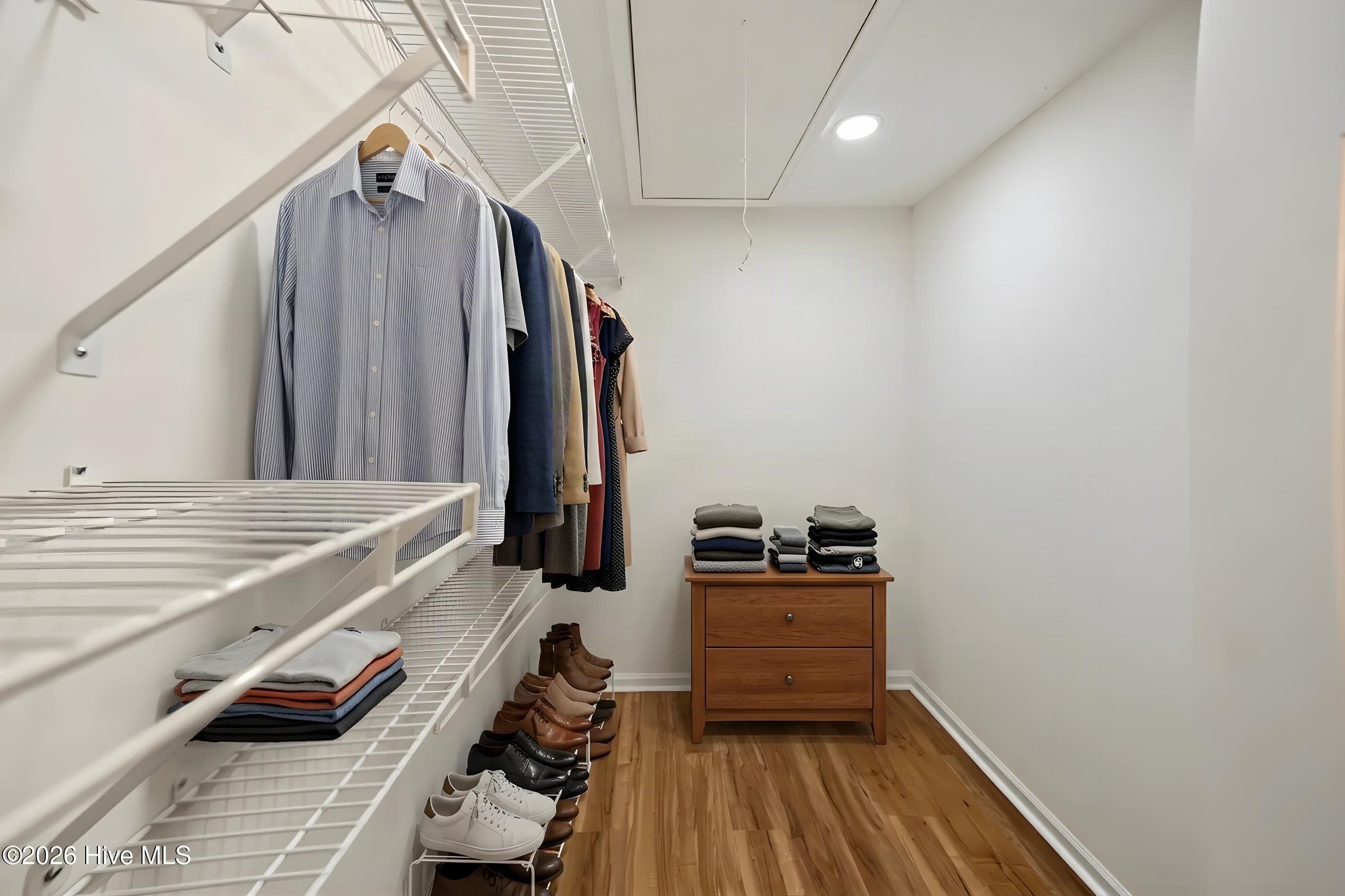 Master closet-virtually staged - 690 Fairway Drive E, Sunset Beach, NC 28468