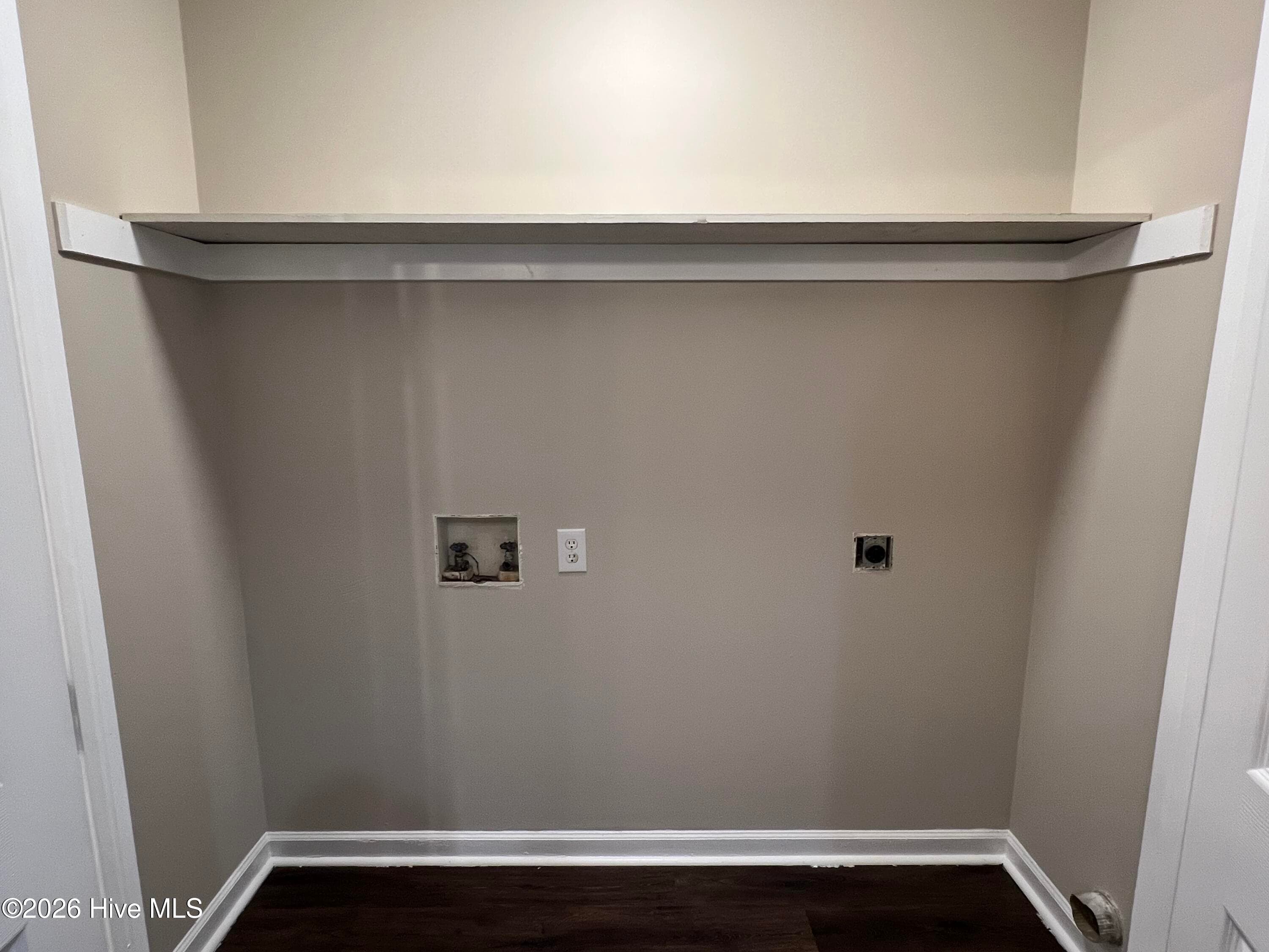 Laundry room. Washer and dryer included on both sides. - 3204 Parkway Court A & B, Greenville, NC 27834