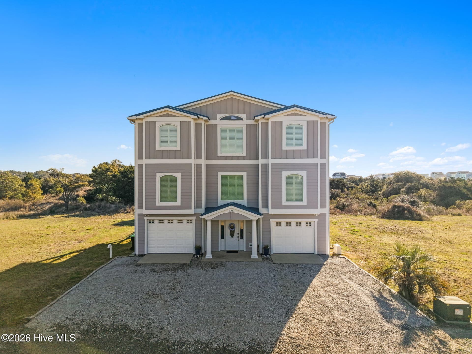 Single Family Residence at 128 Blockade Runner Drive, Holden Beach, NC 28462, photo 3 of 88