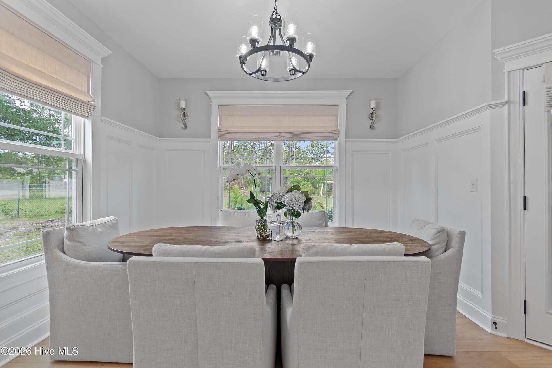 Dining room with high wainscotting. - 299 Boundaryline Drive NW, Calabash, NC 28467
