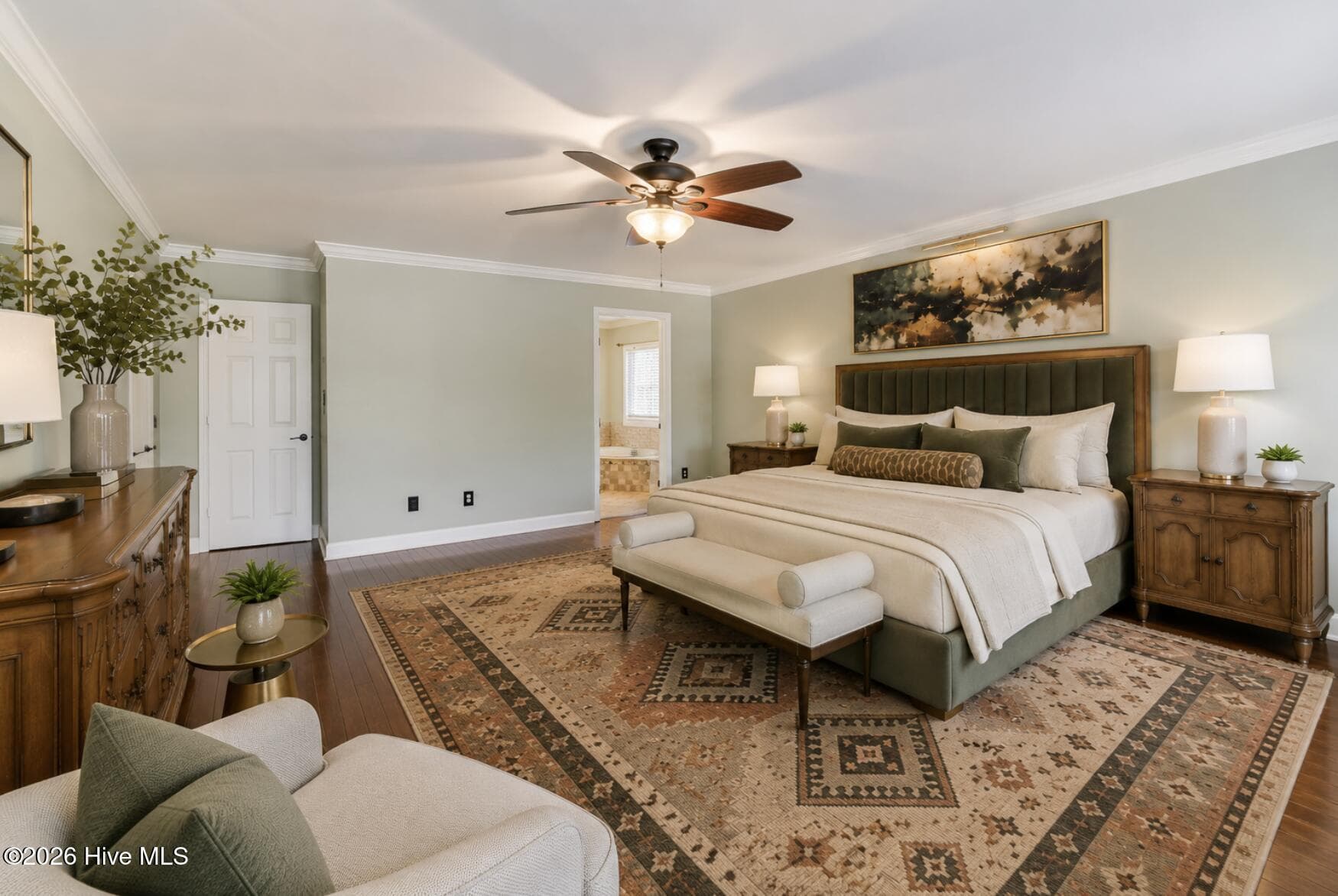 Main floor Master Bedroom: Natural light, generous proportions, and a cozy sitting area make this primary bedroom feel like a true retreat. - 16 Rapids Court, North Augusta, SC 29841