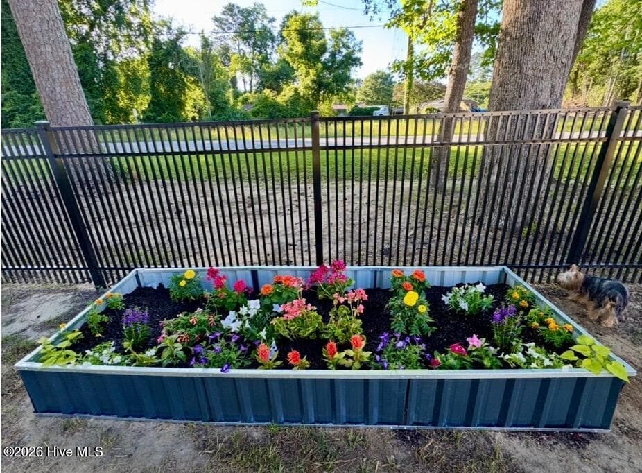 RAISED FLOWER BED WITH SEASONAL FLOWERS - 1874 Slatestone Road, Washington, NC 27889