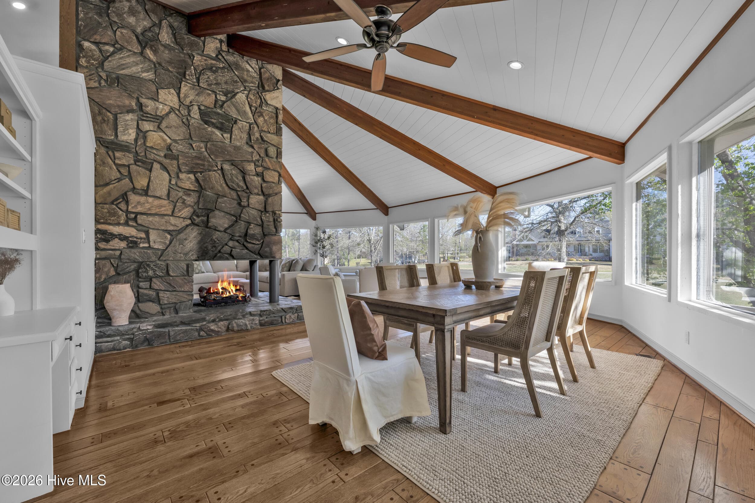 Enjoy a warm fireplace while eating in dining area - 401 S Lake Drive, Thomson, GA 30824