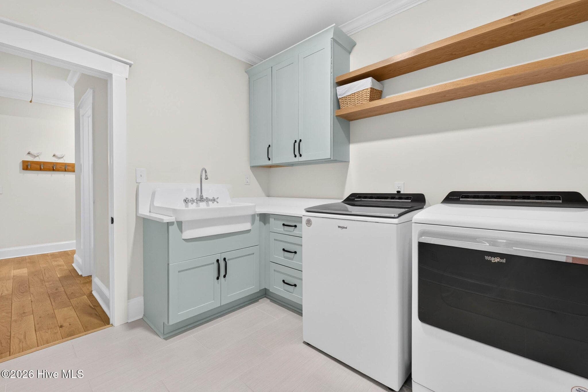 Laundry Room with Sink - 5933 Dutchman Creek Road, Southport, NC 28461