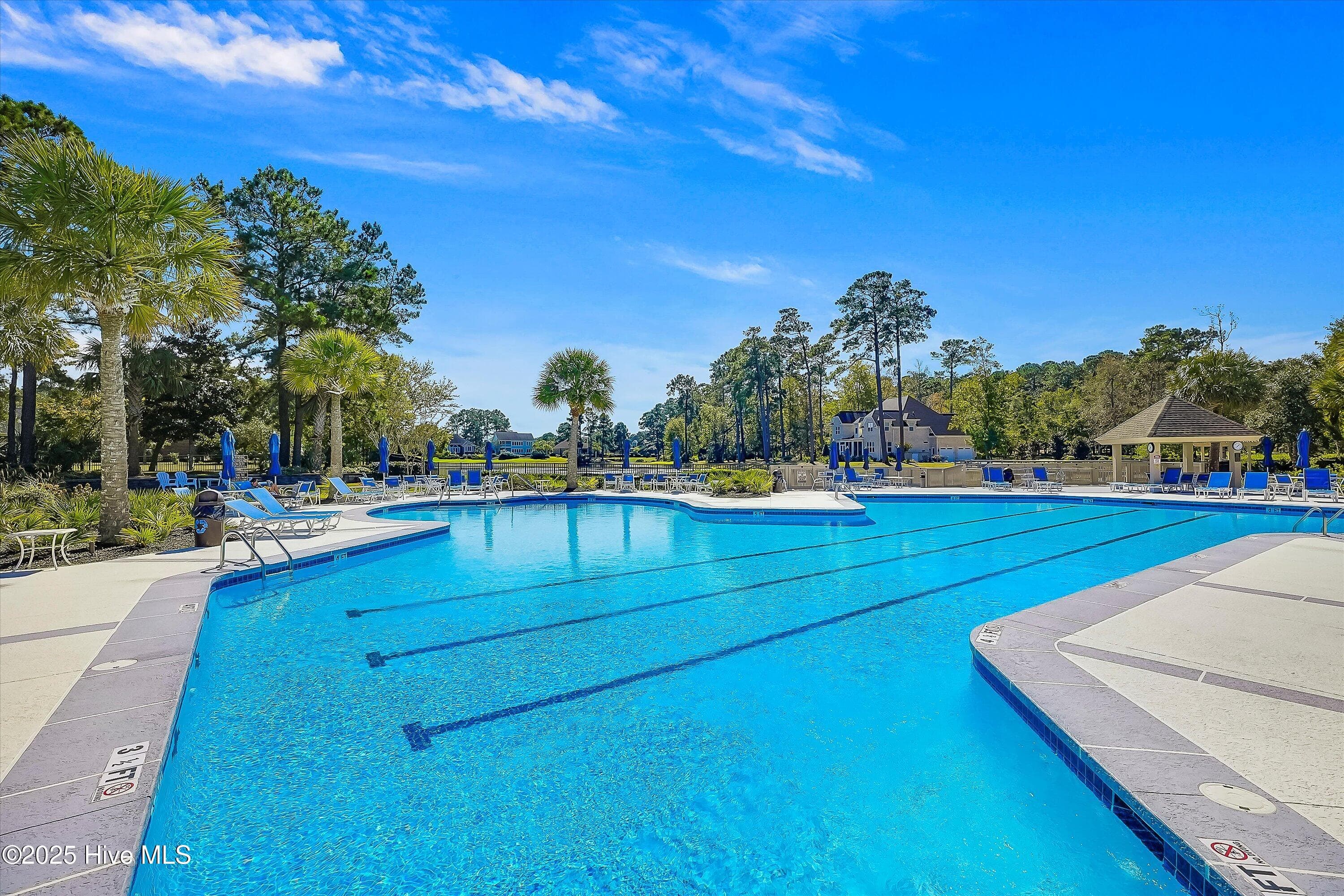 Outdoor pool with lap lanes - 102 Reflection Court SW, Ocean Isle Beach, NC 28469
