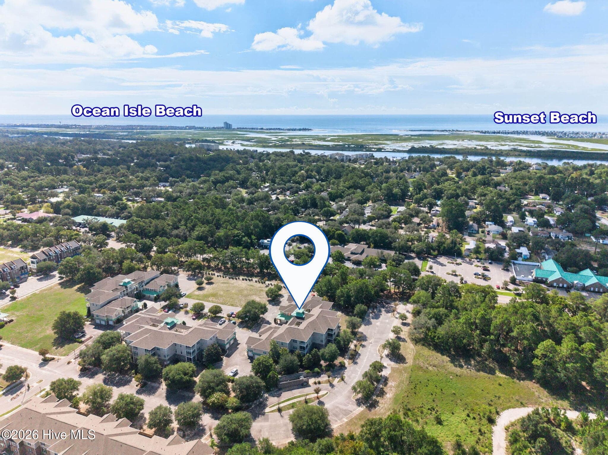 You can't beat this location! Make this home yours! - 7825 High Market Street #303, Sunset Beach, NC 28468