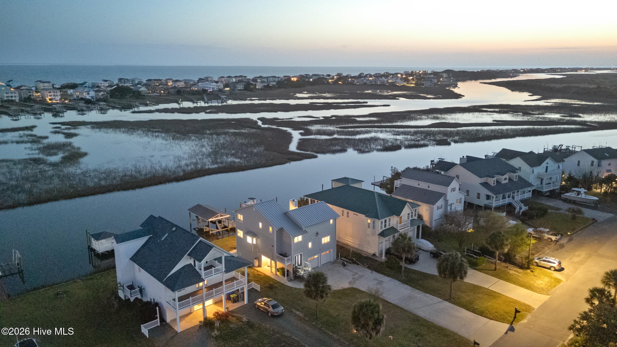 Single Family Residence at 103 E Island Drive, Oak Island, NC 28465, photo 104 of 118