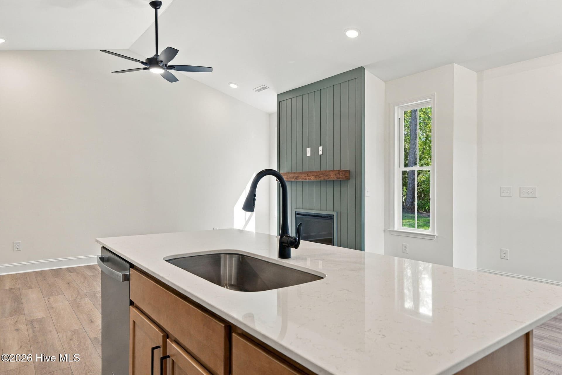 Farmhouse Sink and Spacious Island with dishwasher, power outlets and room for seating - 1224 Petite Terre Court, New Bern, NC 28560