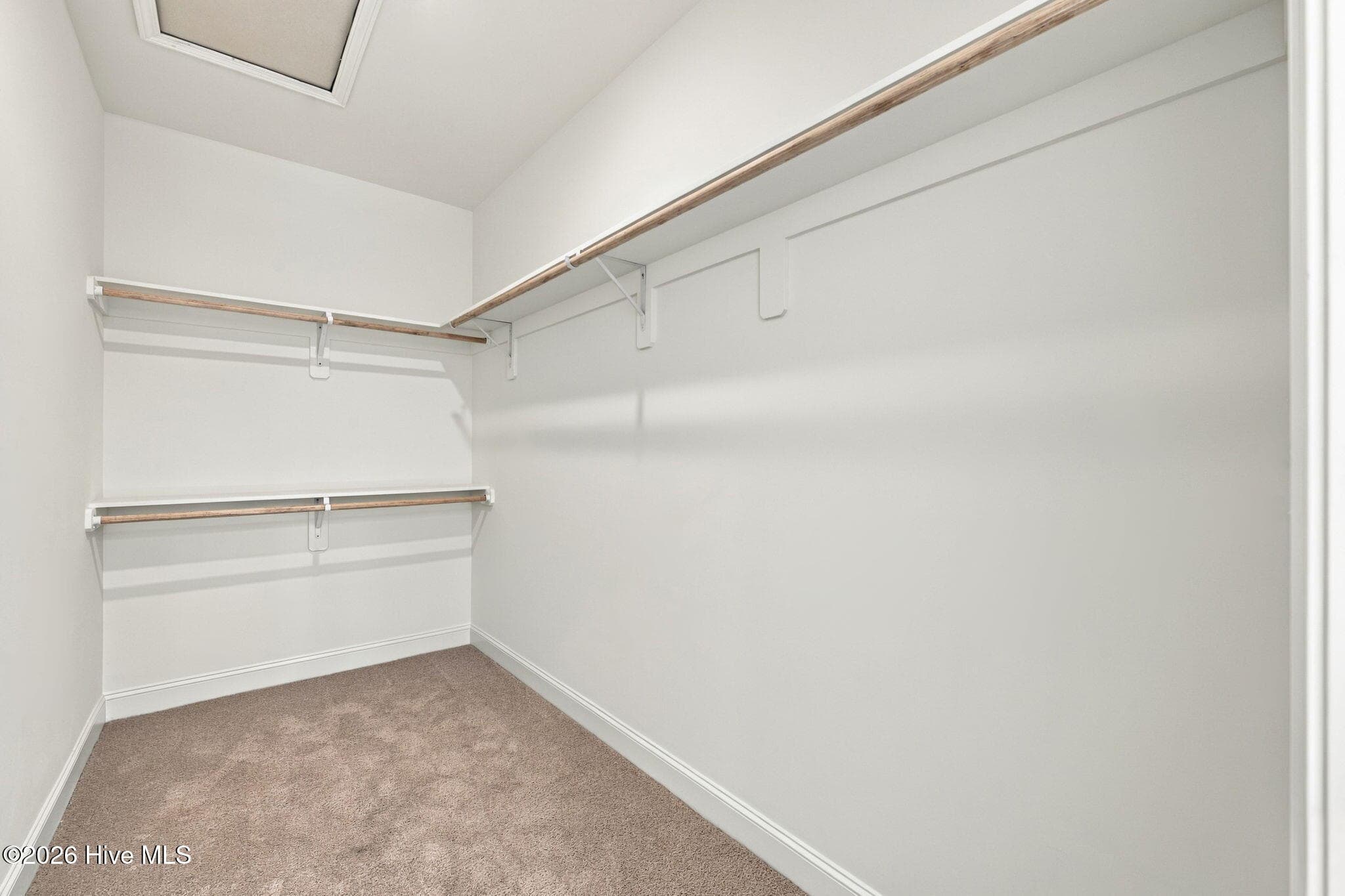 Spacious Walk-In Closet features real wood shelving - 1224 Petite Terre Court, New Bern, NC 28560