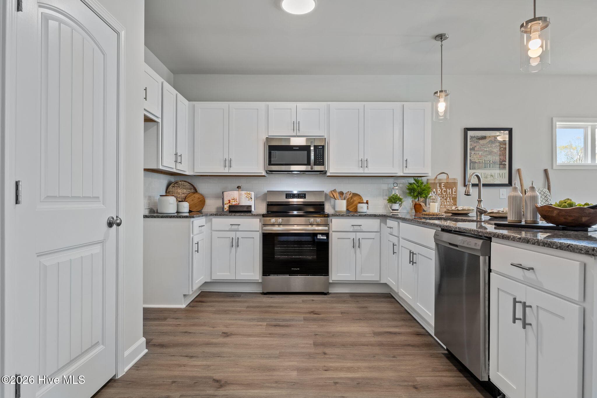 Example photo of similar home with staging. Actual home is under construction. - 4192 Workman Loop 90, Leland, NC 28451
