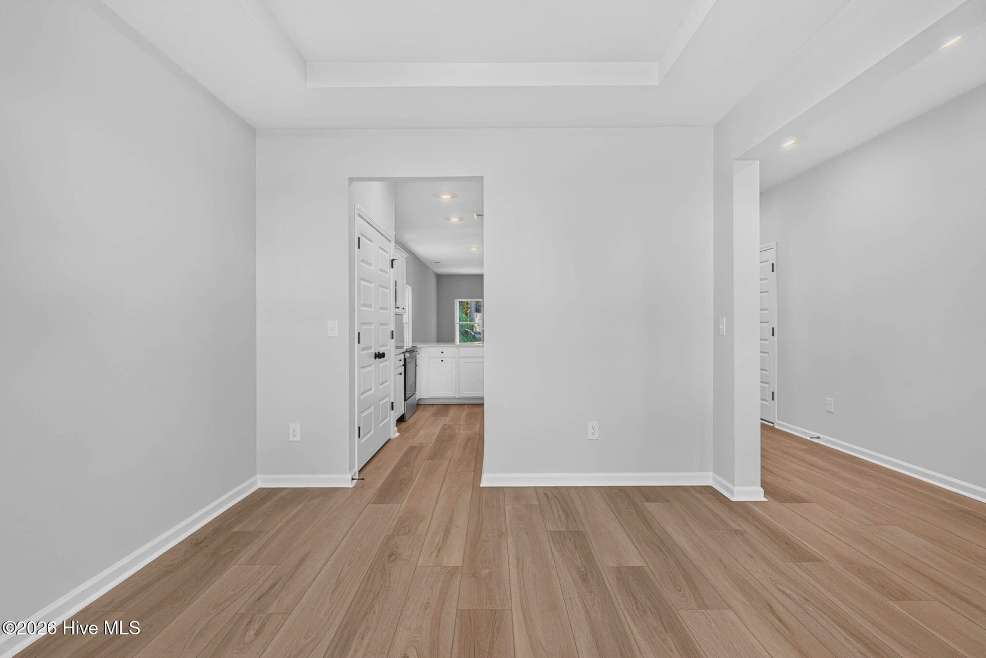 Additional view of the formal dining room, conveniently located near the kitchen and main living areas. - 3447 Sandhill Crane Drive SW, Ocean Isle Beach, NC 28469