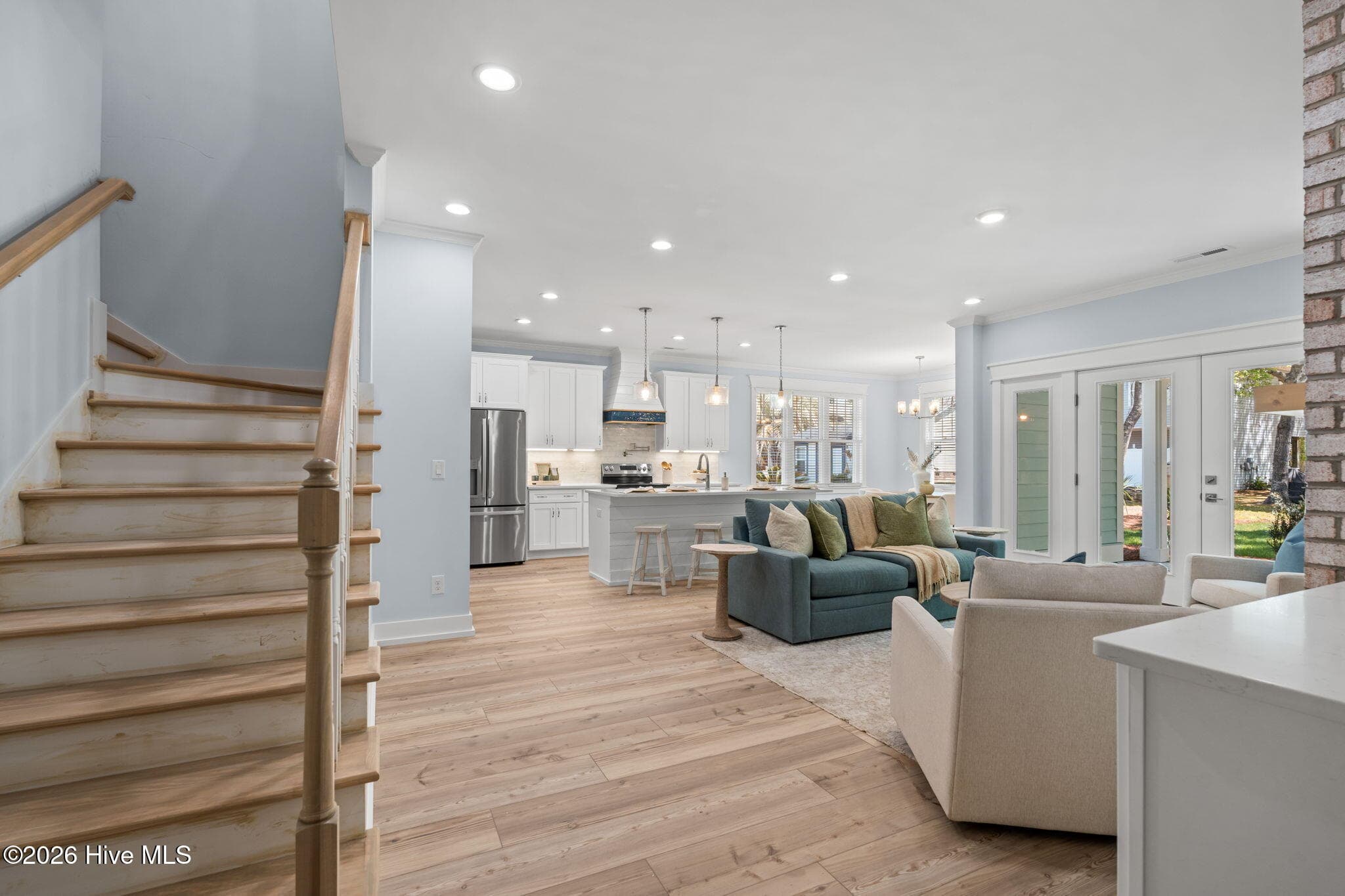 Photos of a staged model of the exact same plan - 312 NE 58th Street, Oak Island, NC 28465