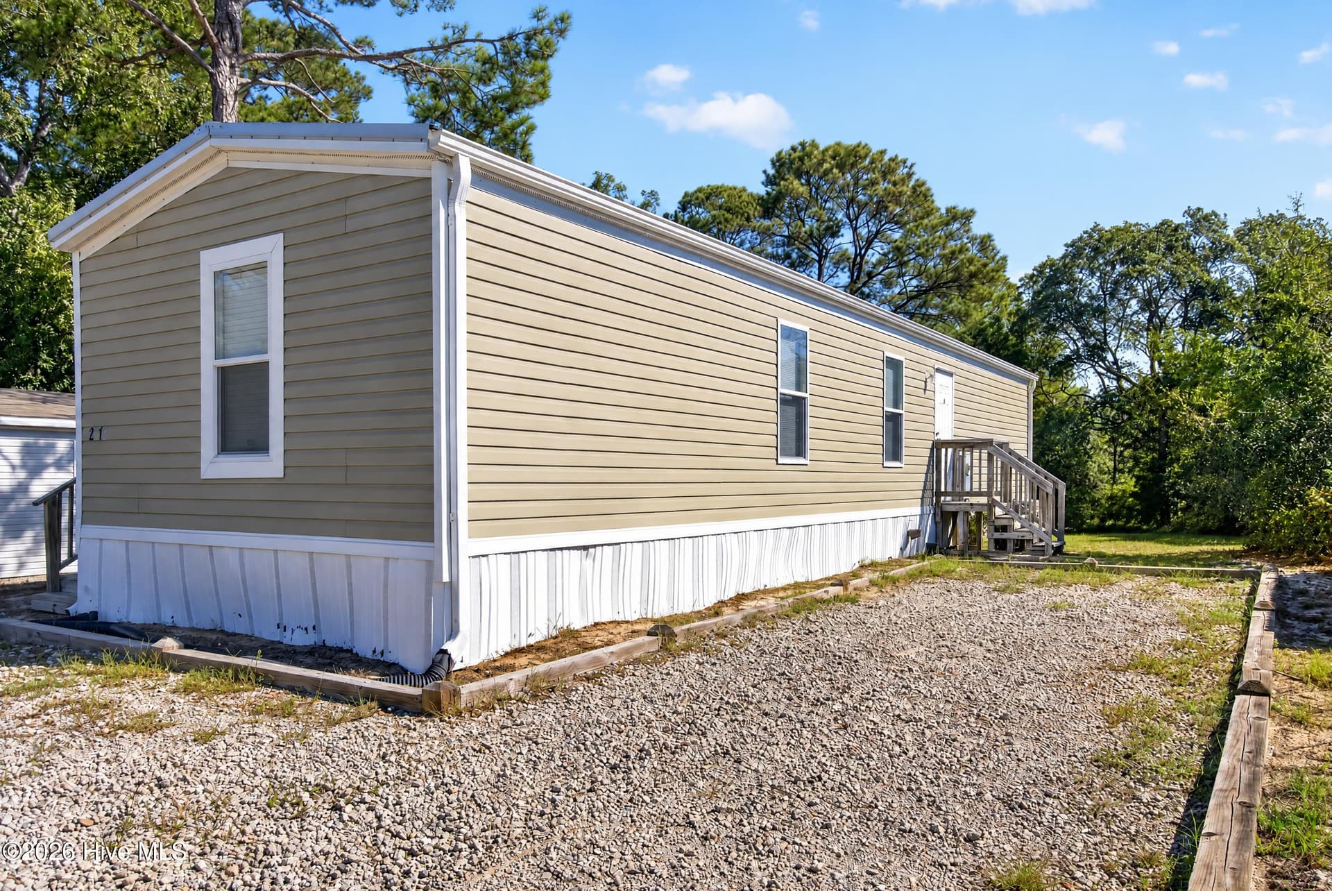 Manufactured Home at 2414 Shoreline Drive SW, Supply, NC 28462, photo 2 of 20