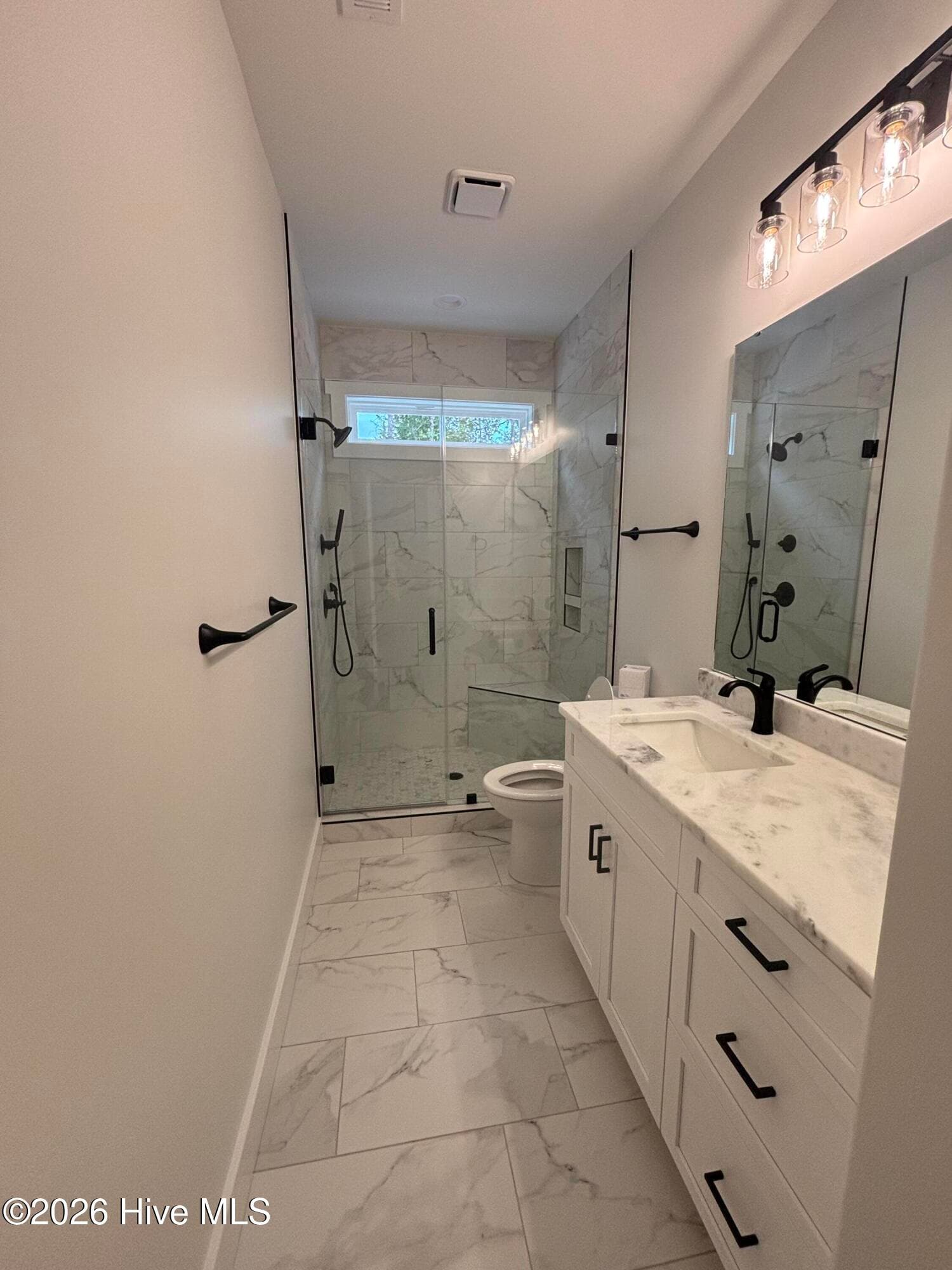 Photo of a similar build tile bathroom - 405 Emerald Landing Drive, Emerald Isle, NC 28594