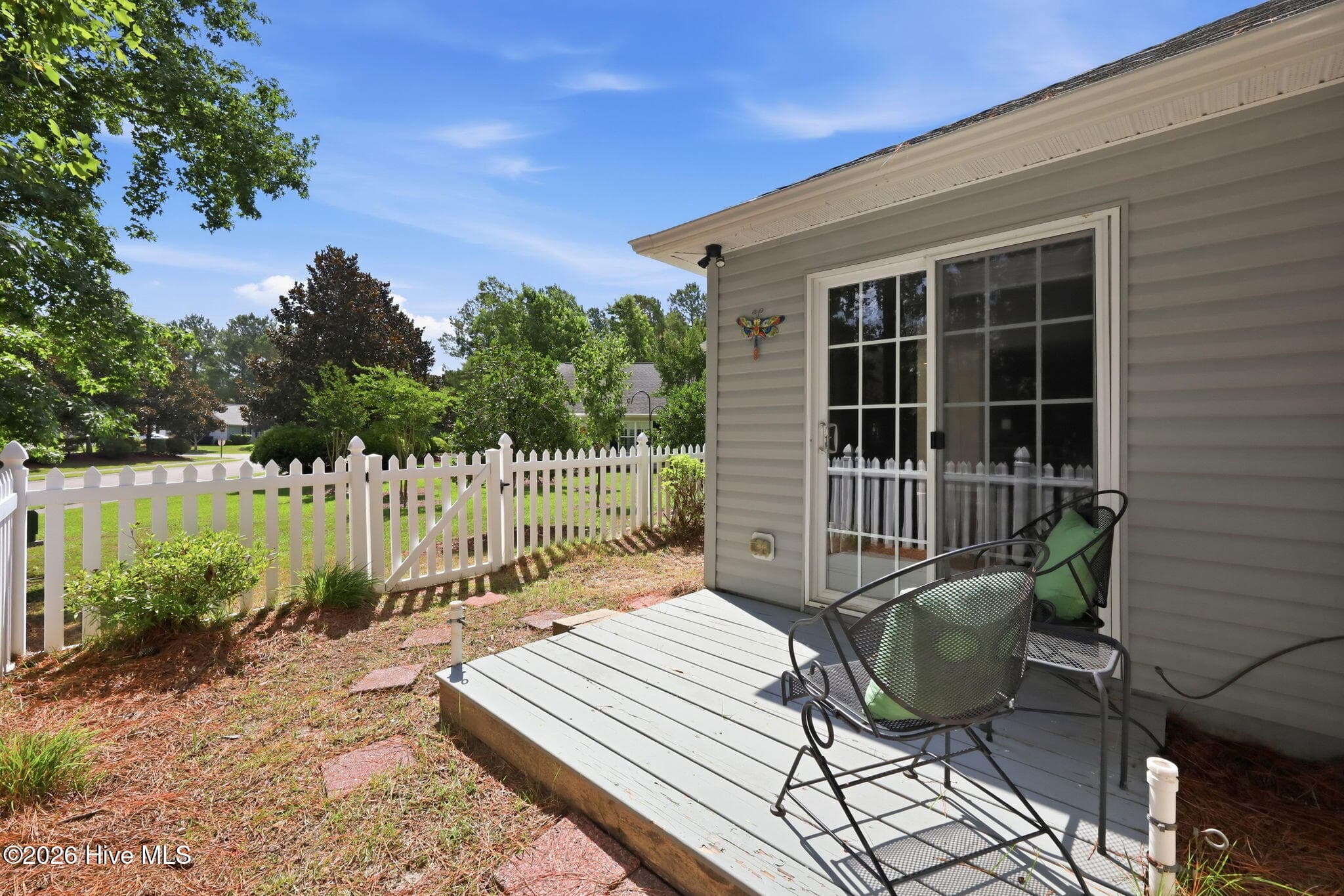 Rear patio and yard - 702 Hummingbird S, Swansboro, NC 28584