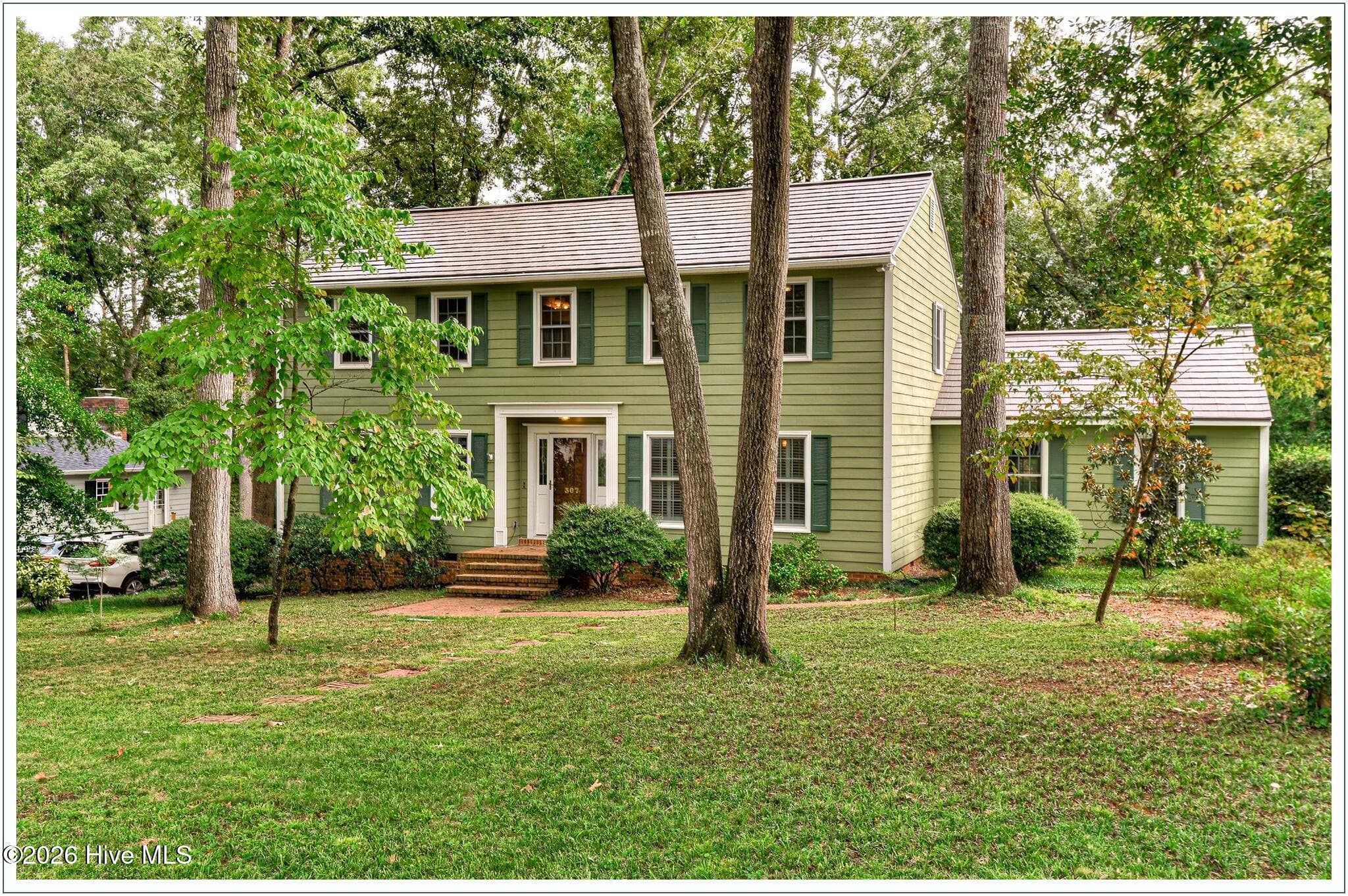 Mature trees and classic charm set the tone at 307 Wakefield Ln N in Martinez. - 307 Wakefield Lane N, Martinez, GA 30907