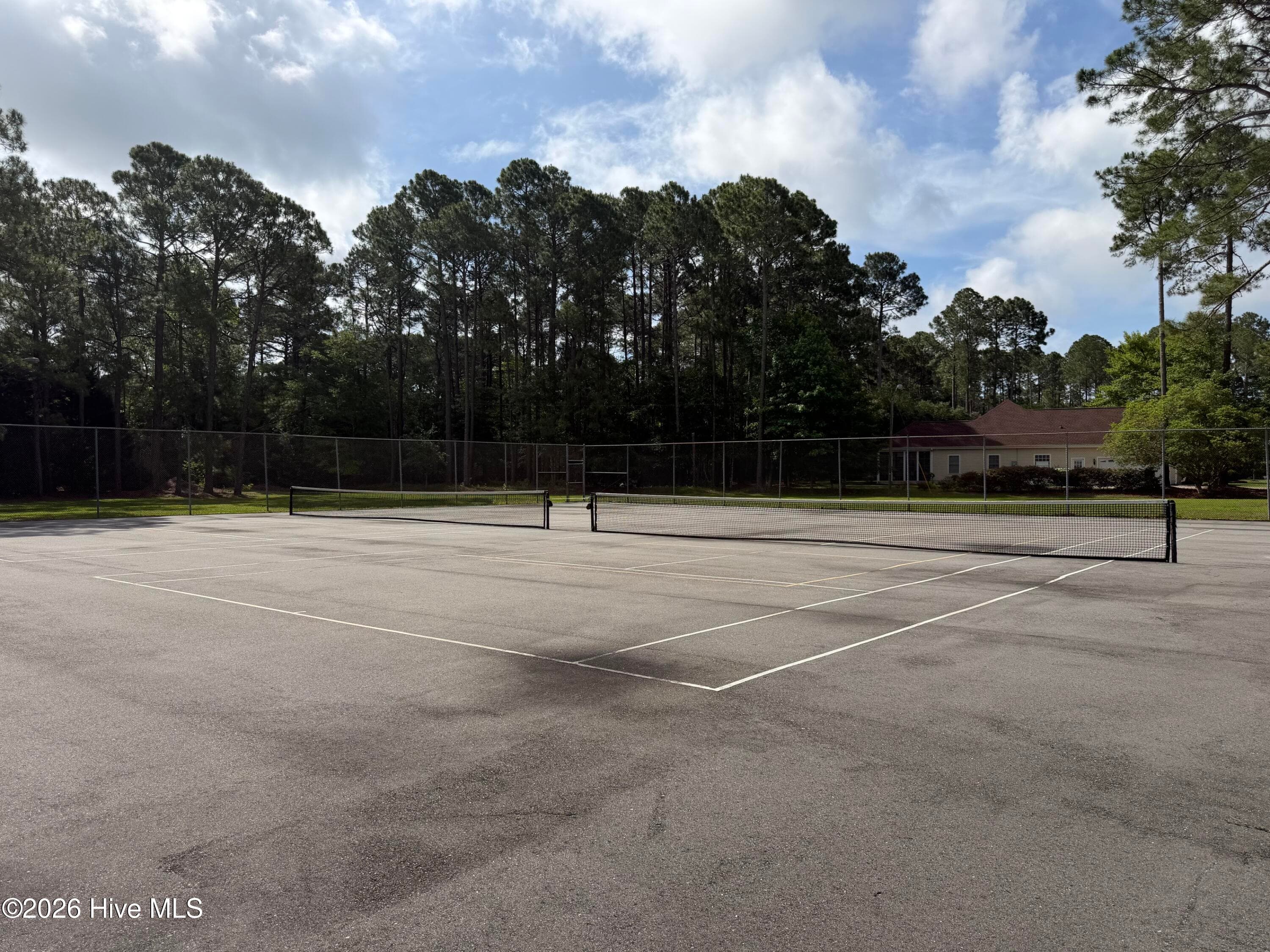 Two full size tennis courts - 299 Boundaryline Drive NW, Calabash, NC 28467