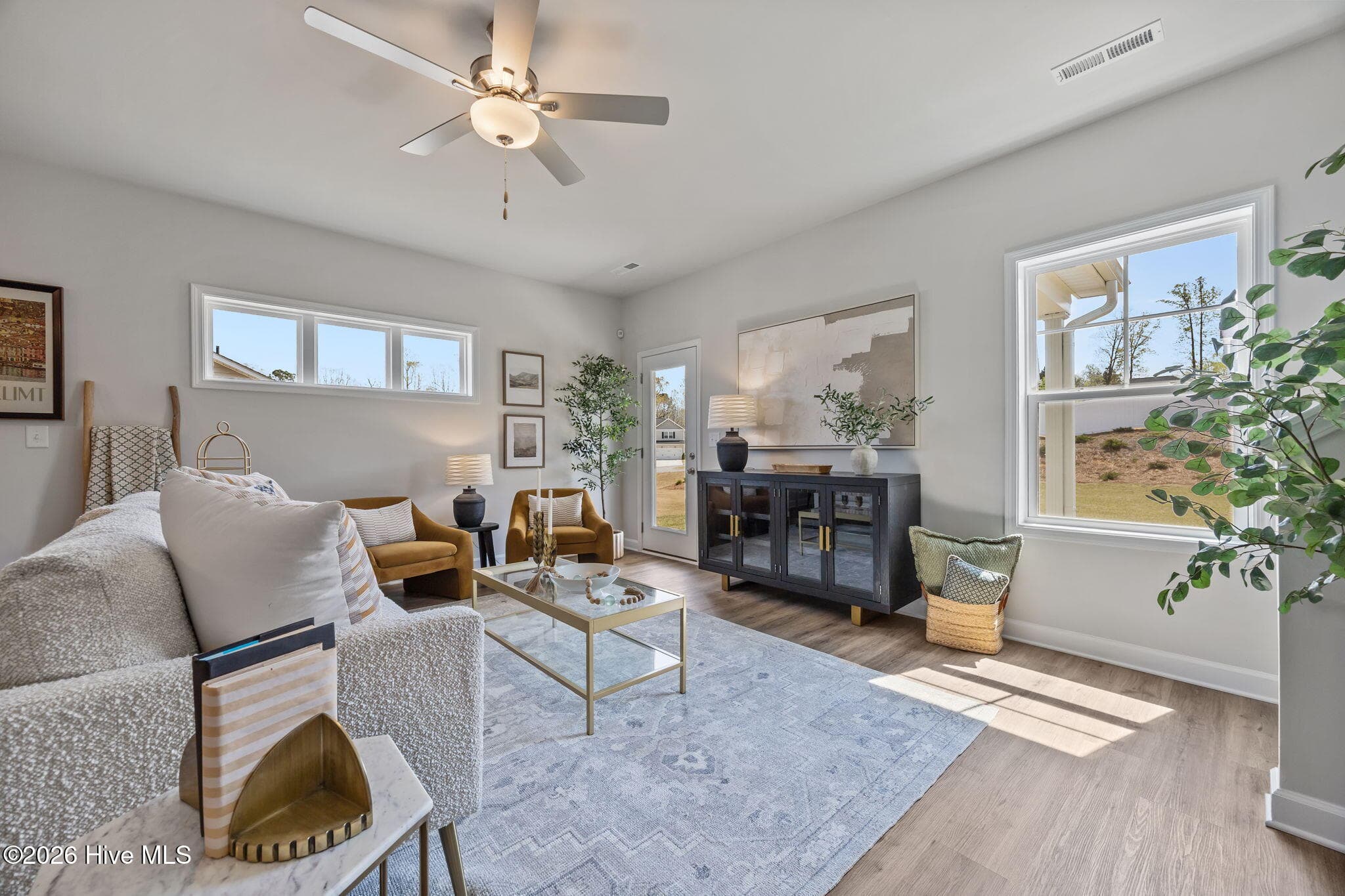Example photo of similar home with staging. Actual home is under construction. - 4192 Workman Loop 90, Leland, NC 28451