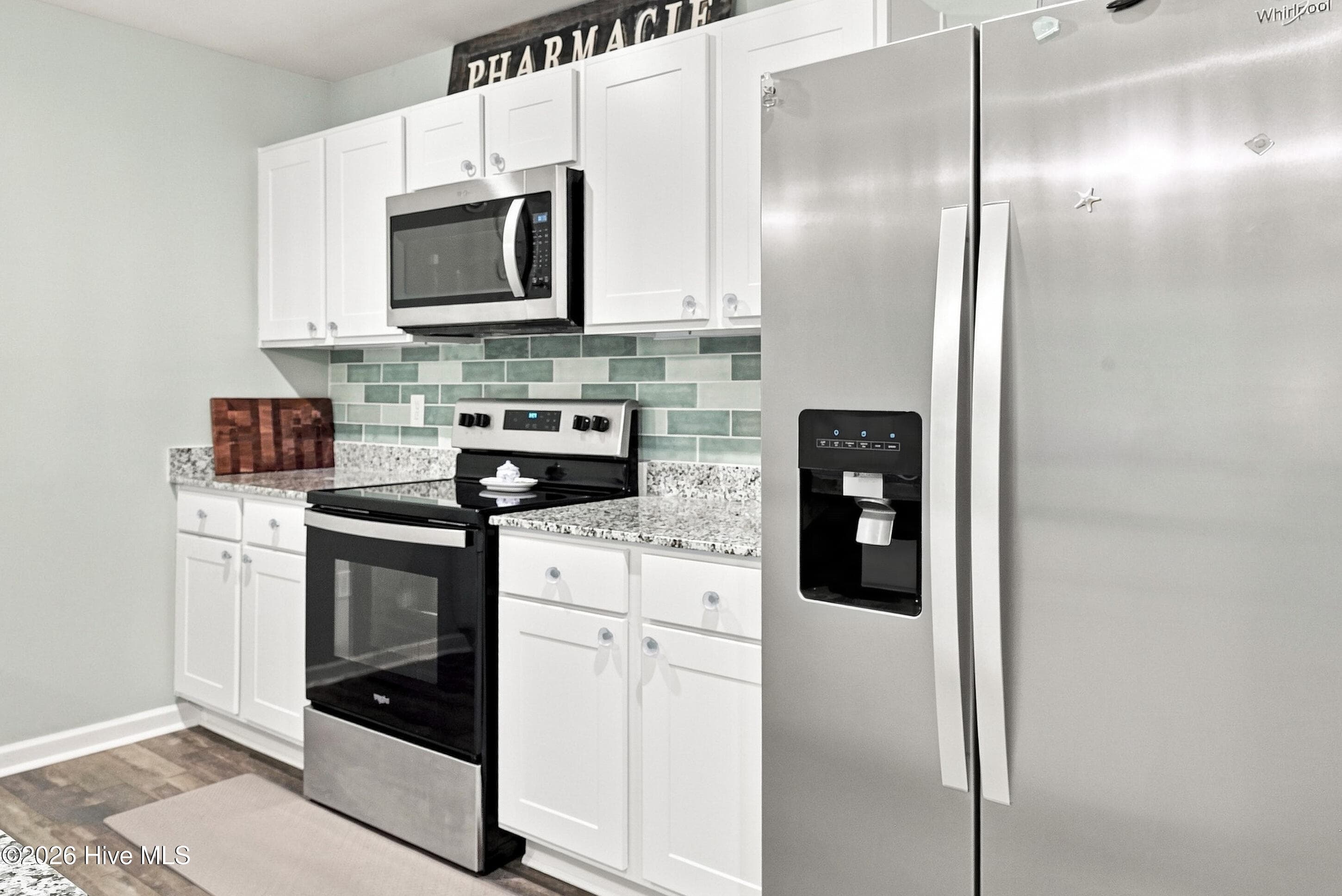 KITCHEN AND BEAUTIFUL BACKSPLASH - 2519 Sendero Drive SE, Bolivia, NC 28422