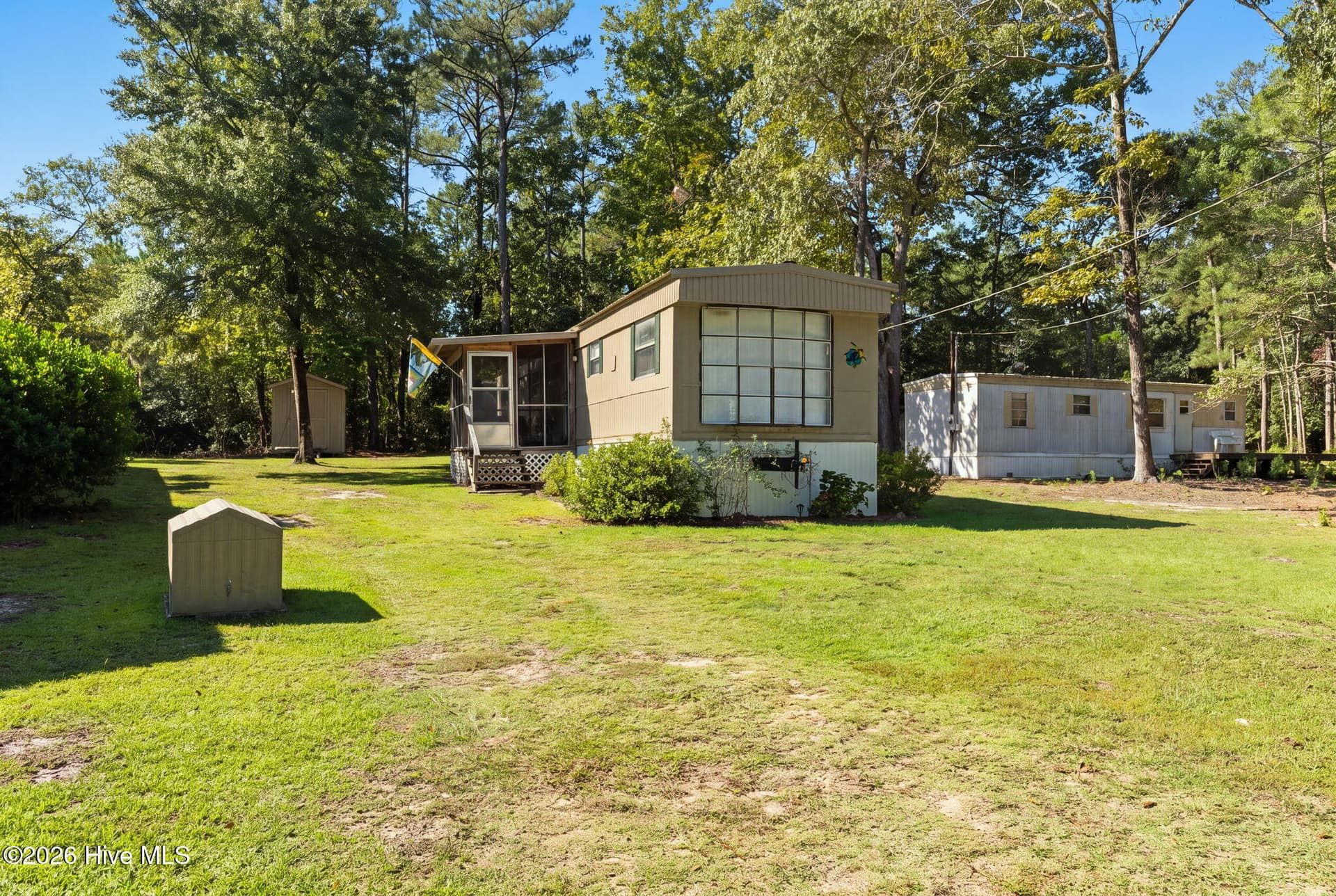 Manufactured Home at 1178 Madera Place SW, Supply, NC 28462, photo 3 of 41