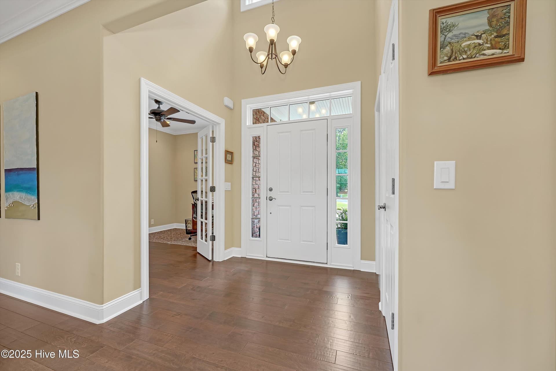 Foyer with Office on left and Half Bath on right - 102 Reflection Court SW, Ocean Isle Beach, NC 28469