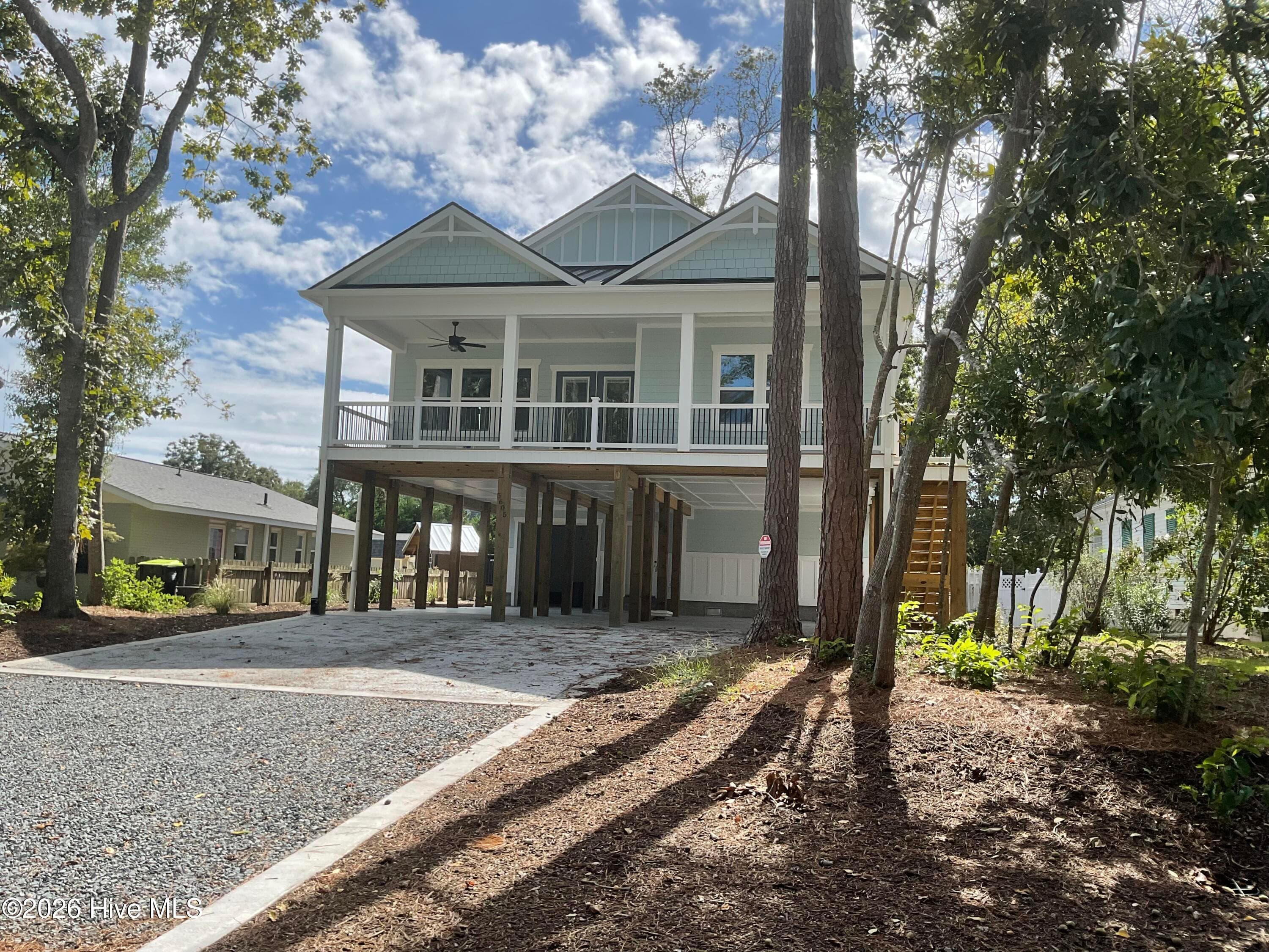 Single Family Residence at 5605 E Yacht Drive, Oak Island, NC 28465, photo 2 of 2
