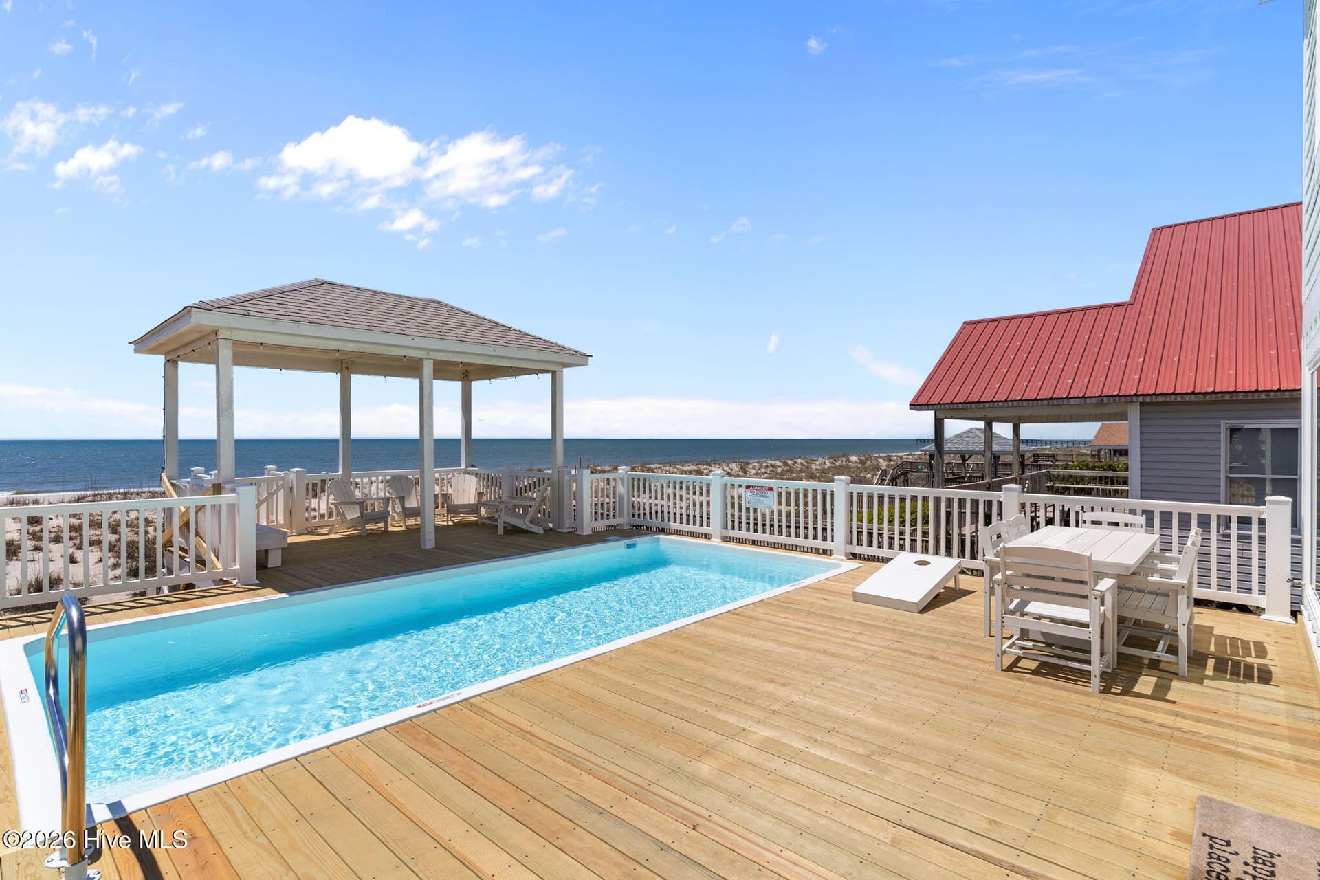 Single Family Residence at 2205 E Beach Drive, Oak Island, NC 28465, photo 2 of 4