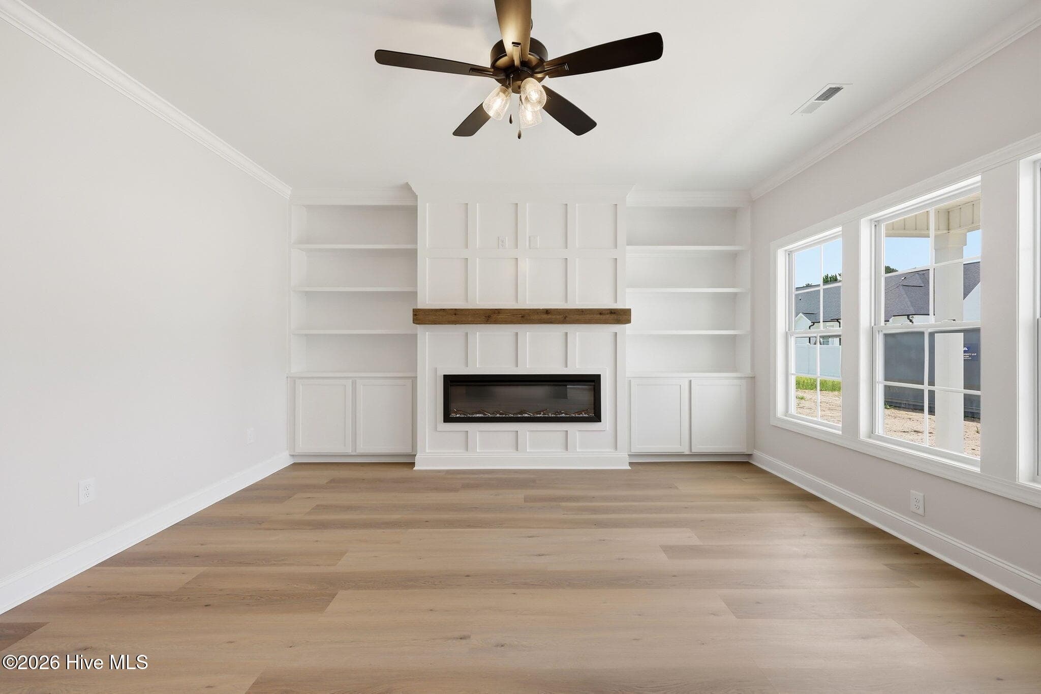 Bookcases, storage and custom mill work brings the detail to this room - 1005 Finn Court, Greenville, NC 27834