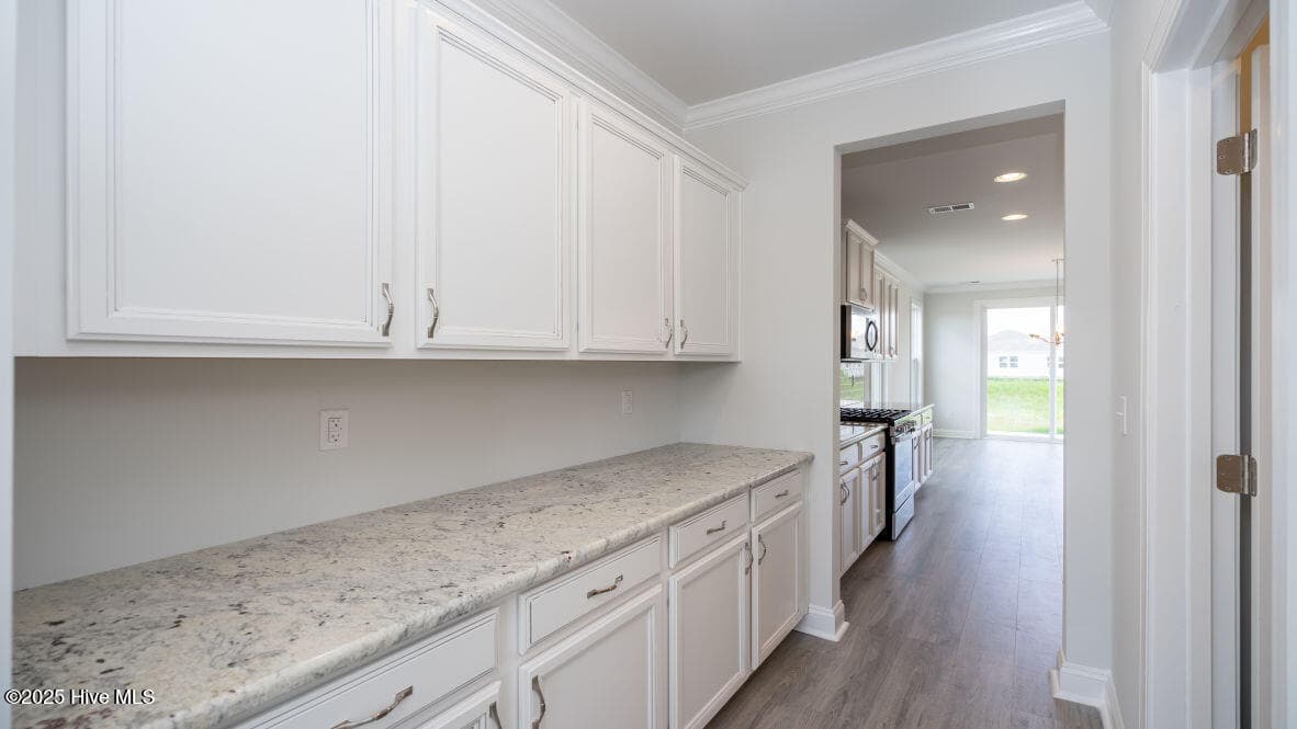 Photo is similar to actual home. Home is currently under construction. Features, colors and options may be different from those shown in representative photos. Call for detailed information. - 3221 Butterfly Ginger Street Lot 74, Leland, NC 28451