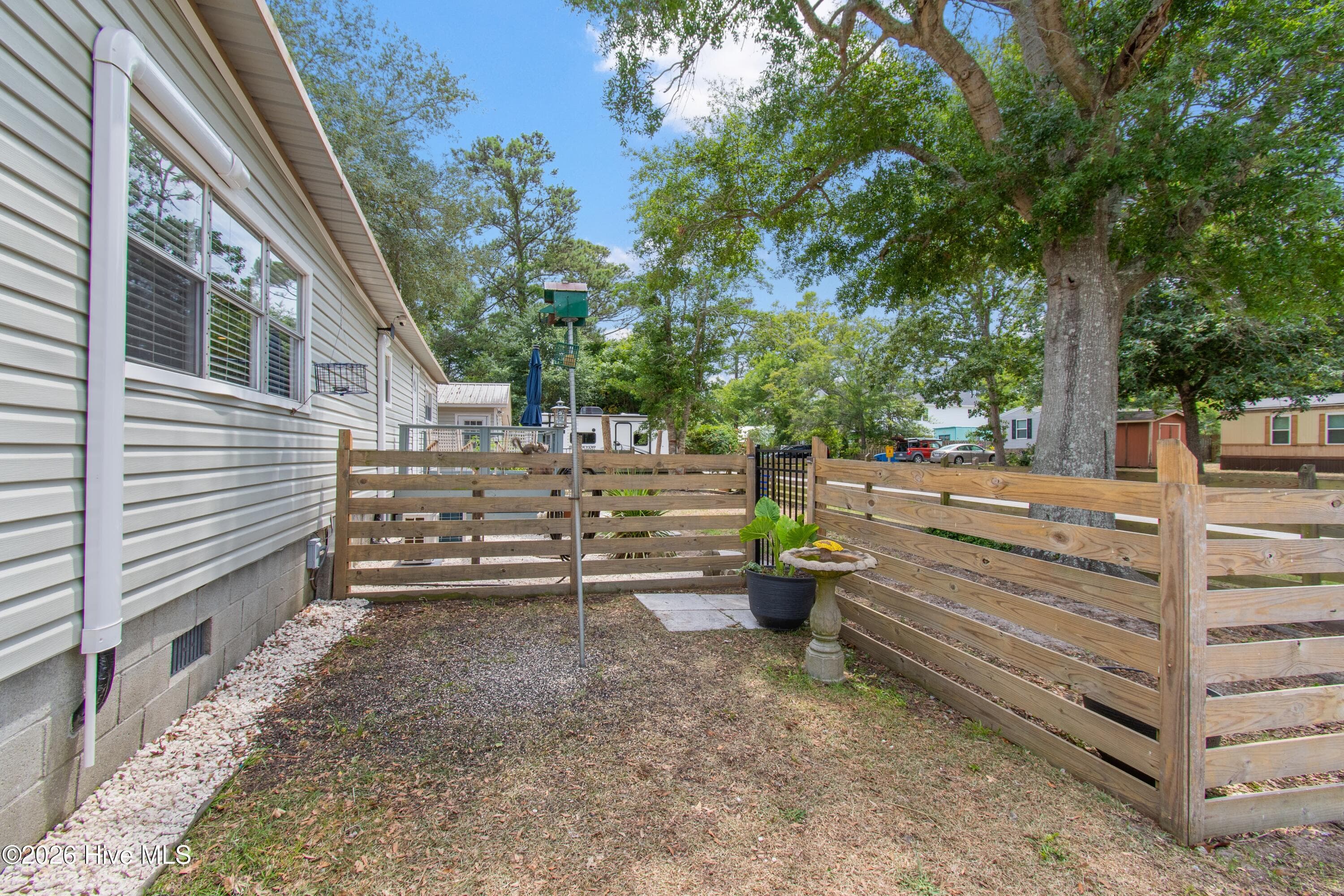 Manufactured Home at 7701 E Yacht Drive, Oak Island, NC 28465, photo 34 of 69