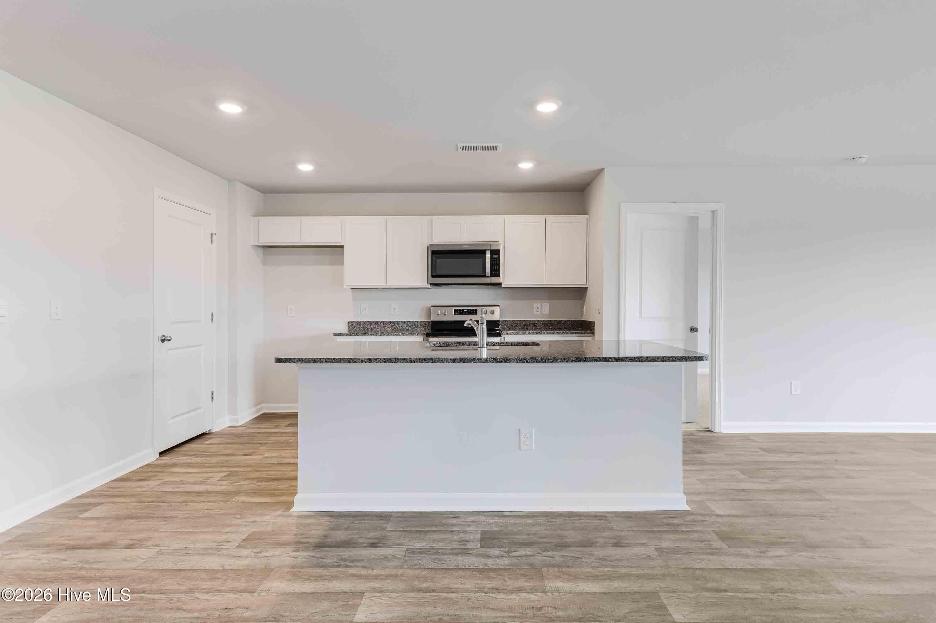 Photos are of a similar, completed home. Actual colors may vary - 3085 Golden Field Drive SE Lot 78, Bolivia, NC 28422