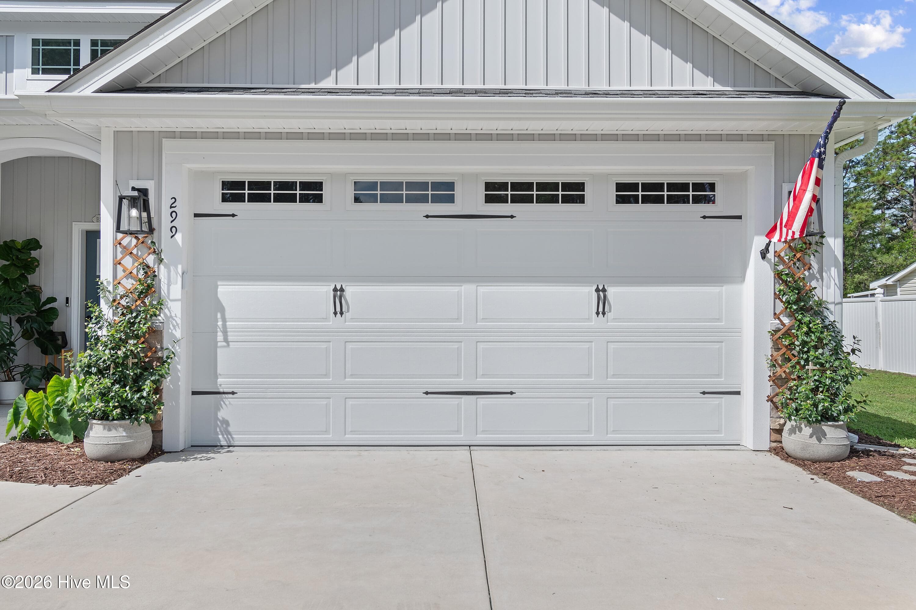 Two car garage with easy access to the foyer - 299 Boundaryline Drive NW, Calabash, NC 28467