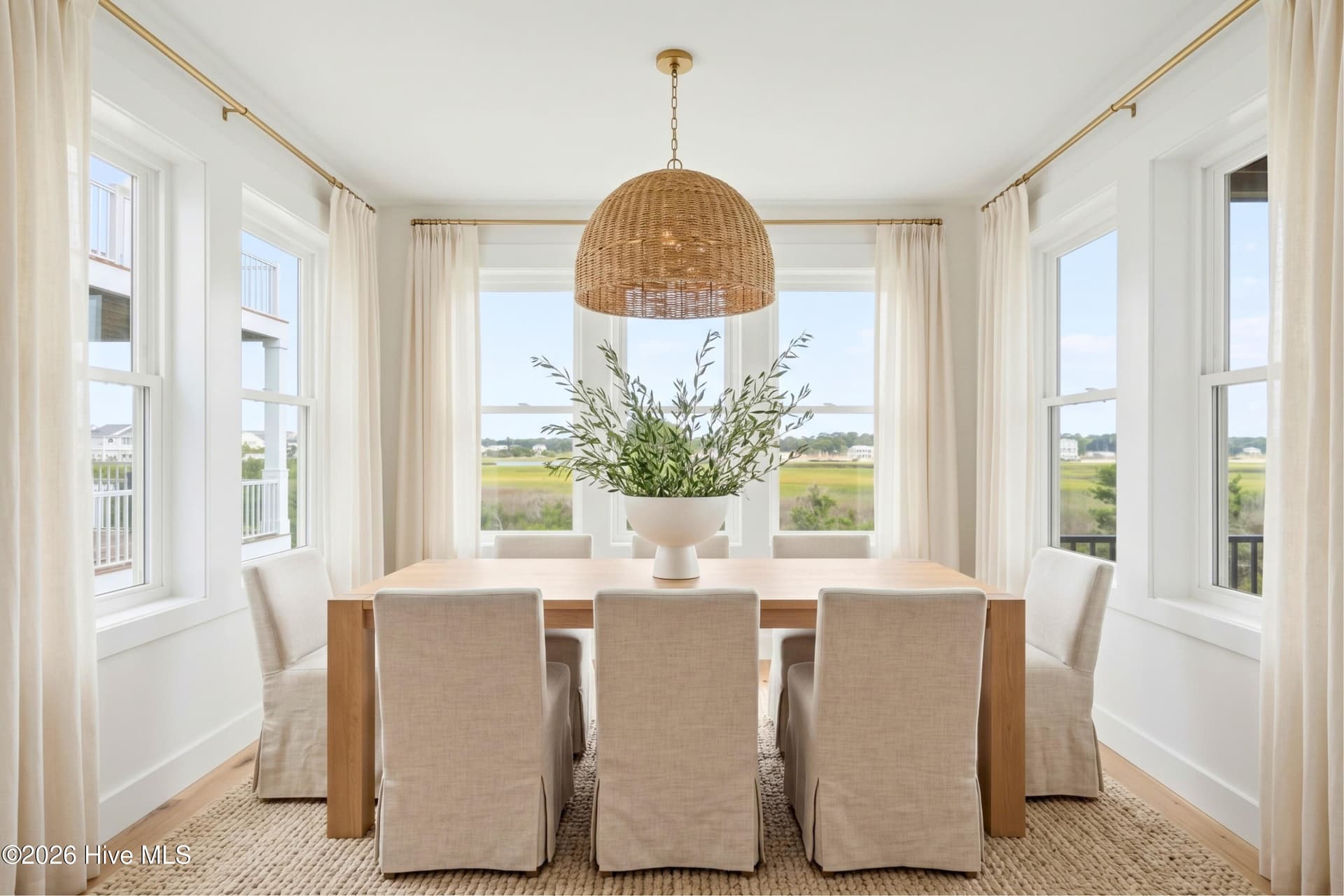 Dining room overlooking the salt marsh - staged - 41 Grand View Drive, Ocean Isle Beach, NC 28469