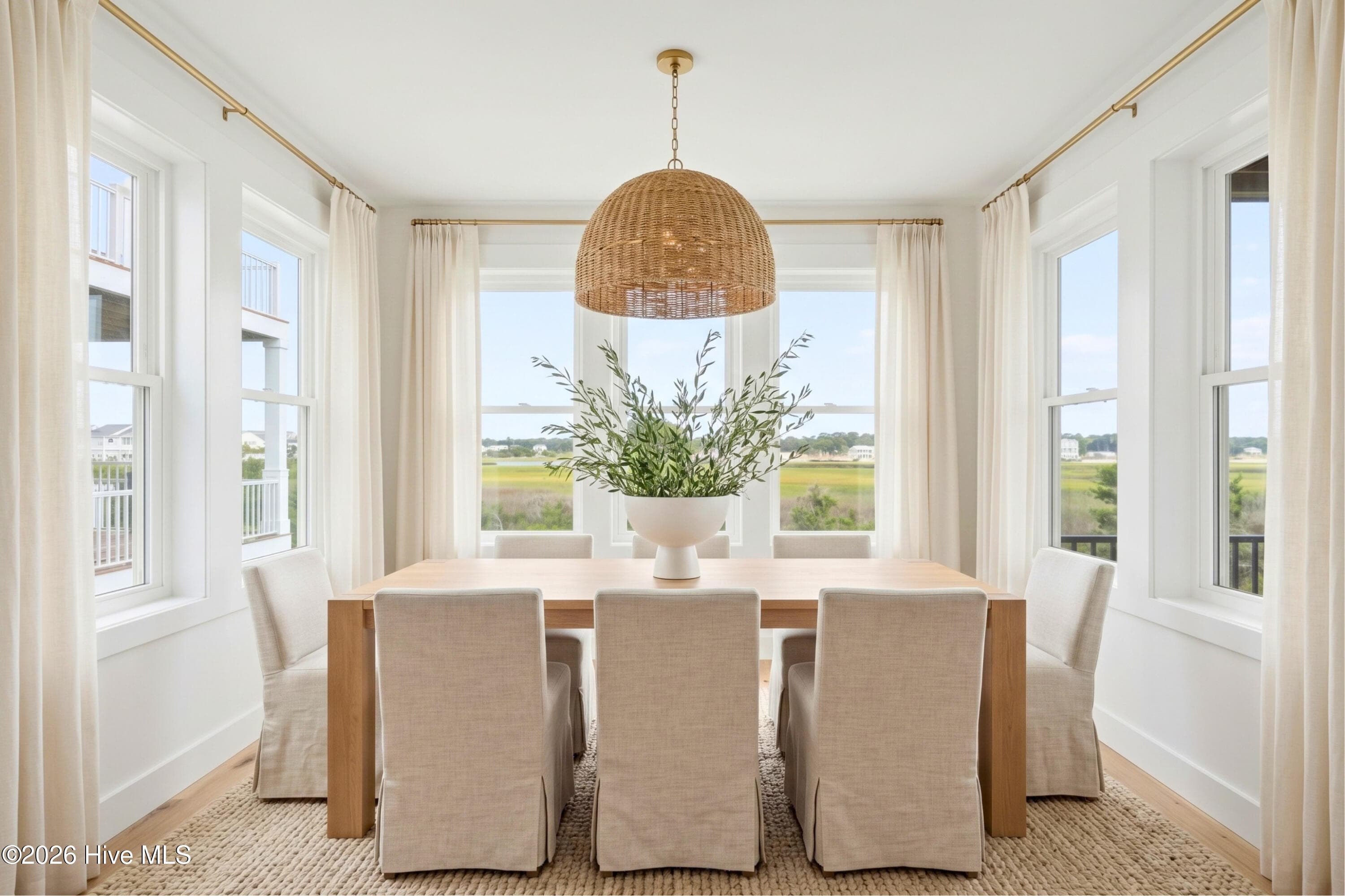 Dining room overlooking the salt marsh - staged - 41 Grand View Drive, Ocean Isle Beach, NC 28469