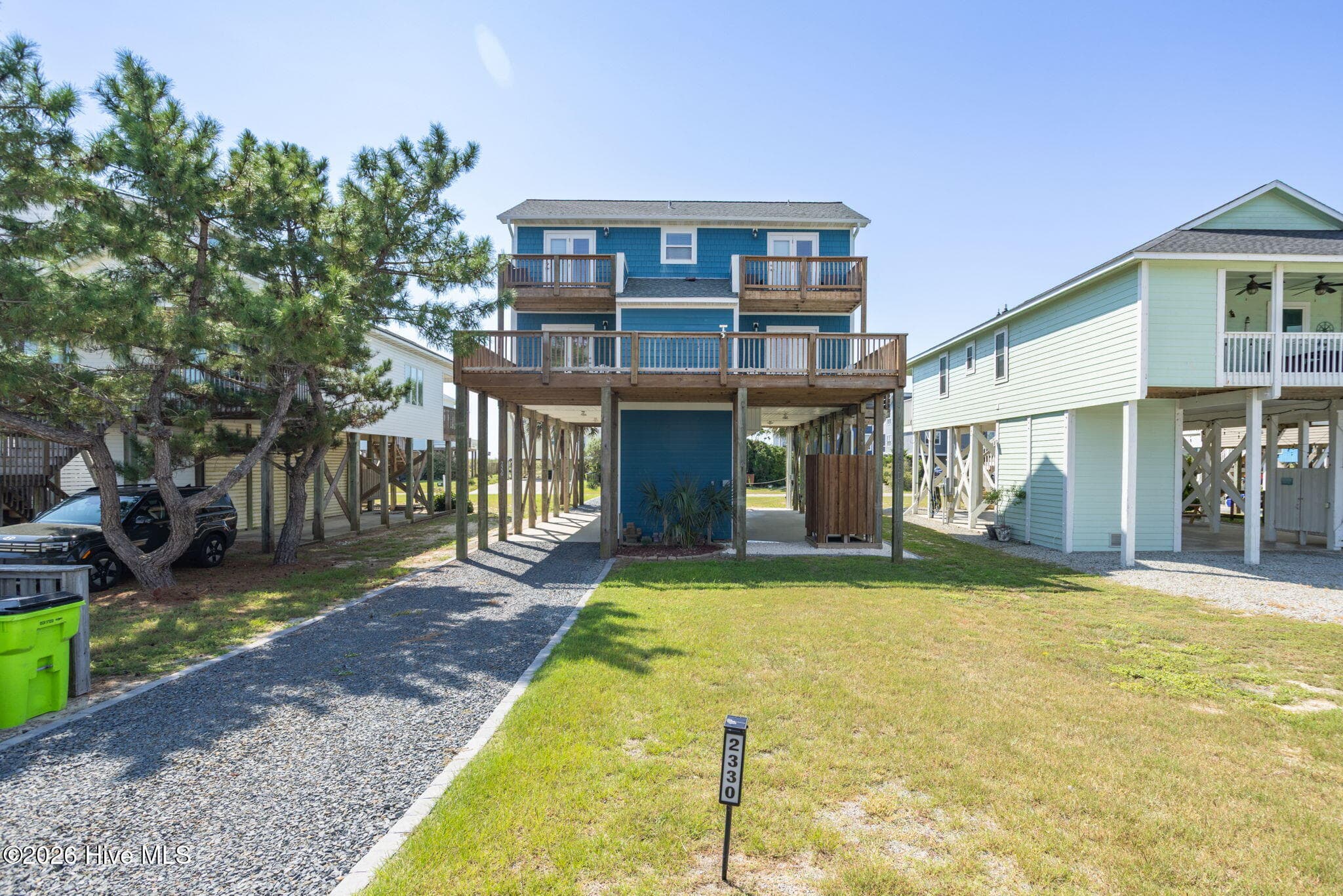 Front exterior from street - 2330 W Beach Drive, Oak Island, NC 28465