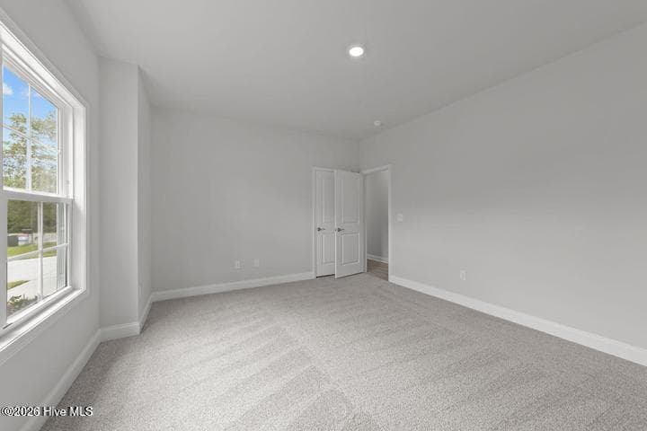 *Only $1000 down and financial incentives offered with use of a preferred lender! Home is currently under construction. Photos are of the same floor plan in a different community and are for layout purposes only. Upgrades, colors and finishes may differ. - 202 Eliza Way, Winterville, NC 28590