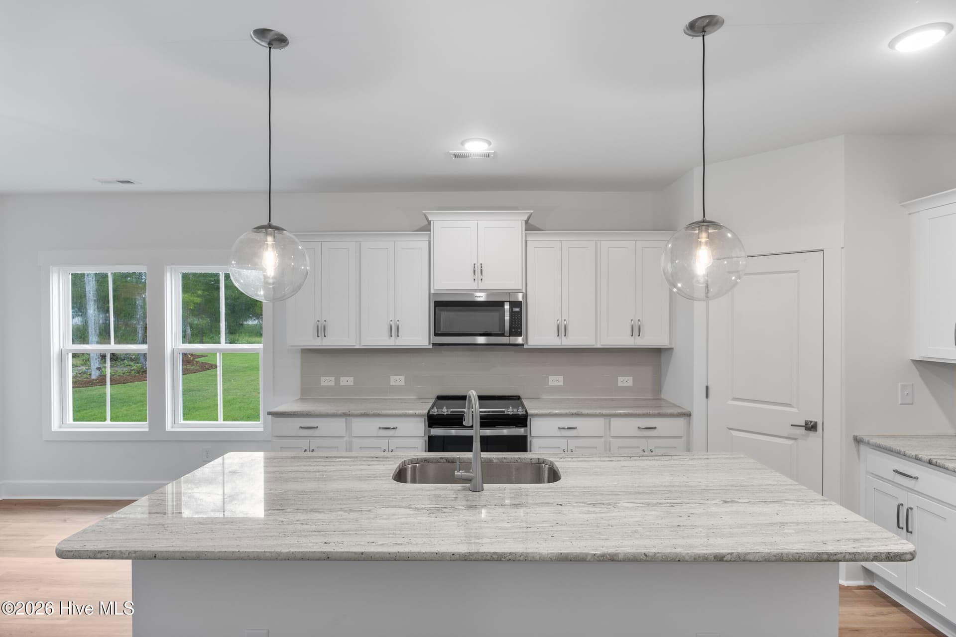 Home shown is a representation of the floor plan and may include optional features or upgrades. Elevations, materials, colors, finishes, square footage, and included features may vary from the actual home. Please consult a Sales Representative for complete details. - 4491 Village Green Drive SW Homesite 93, Shallotte, NC 28470