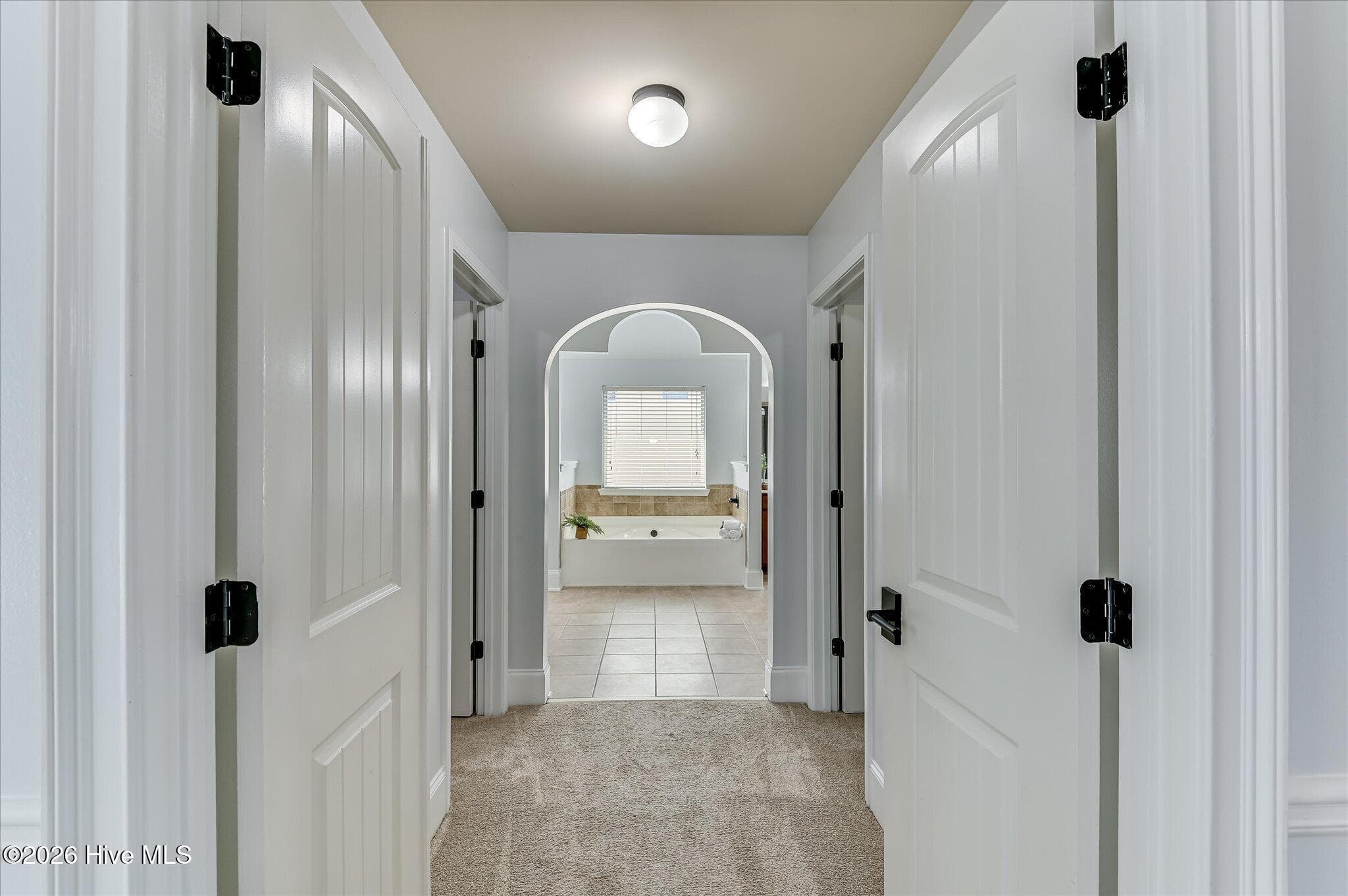 PRIMARY BEDROOM HALL CLOSETS & TO BATHROOM - 552 Oconee Circle, Evans, GA 30809