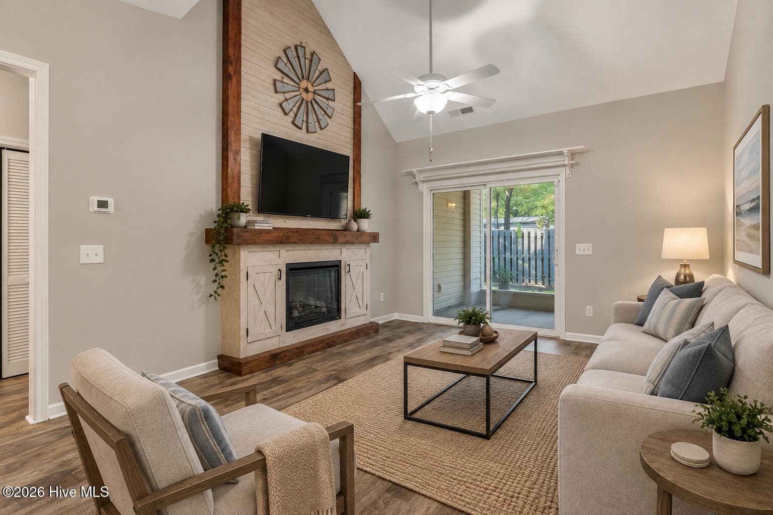 Virtually staged showing white wash of wall feature. Currently stained wood. - 1632 Sugarberry Circle 77, Leland, NC 28451