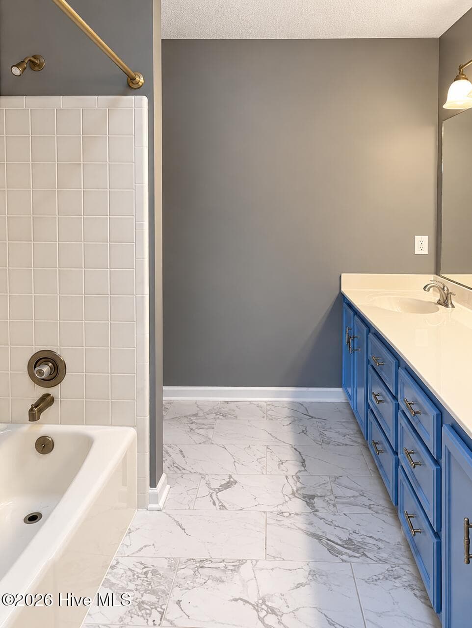 Owner bathroom with double vanity, tile flooring, freshly painted cabinets, separate tub and private commode room with shower. - 4164 Quail Springs Circle, Augusta, GA 30907