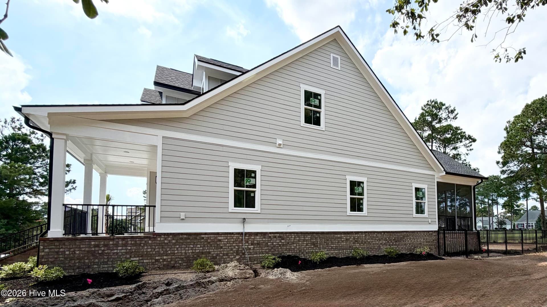 Side view, under construction. - 550 Glenburnie Street NW, Calabash, NC 28467
