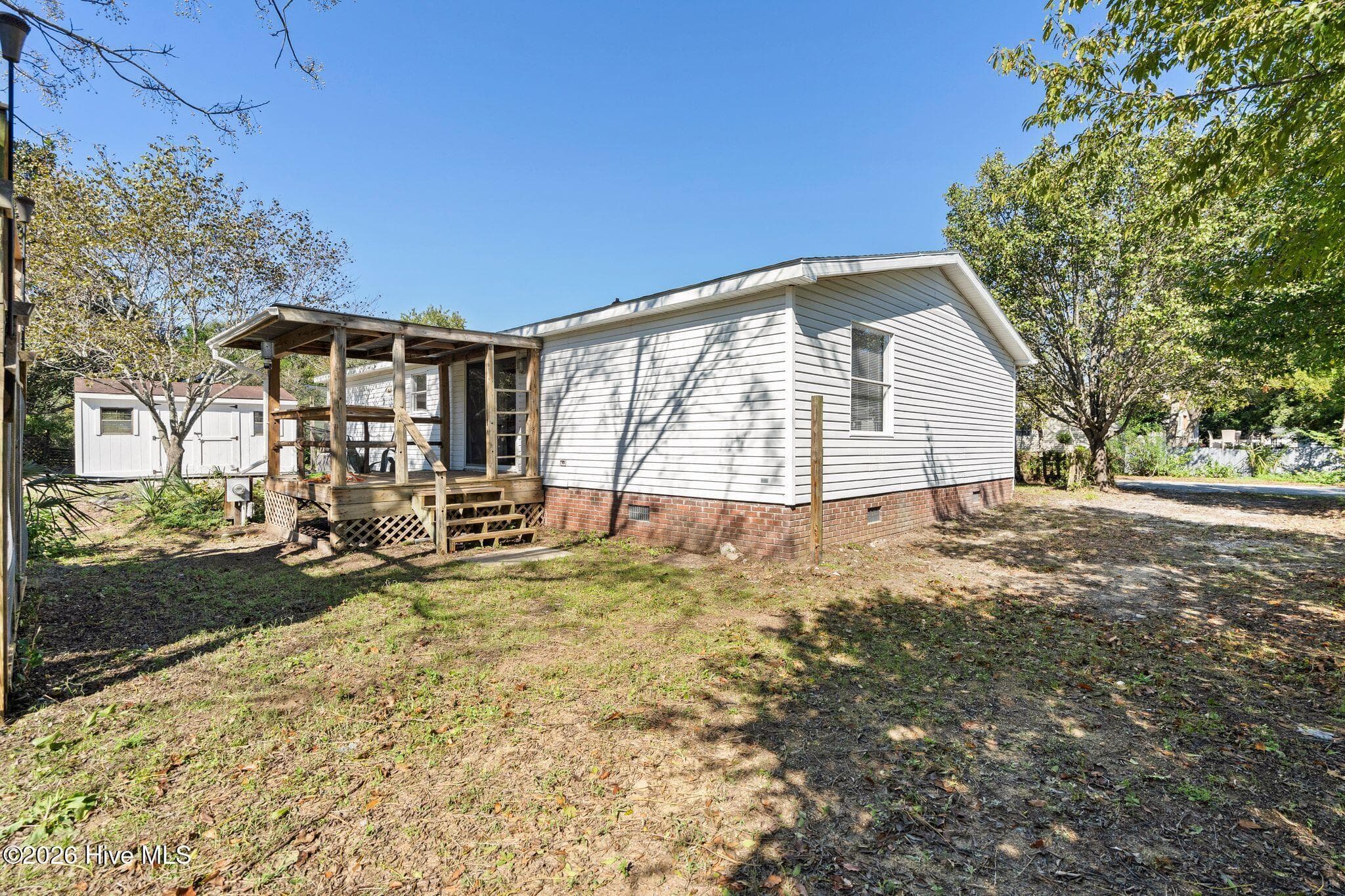 Manufactured Home at 6140 Carolina Beach Road Trlr 28, Wilmington, NC 28412, photo 45 of 54