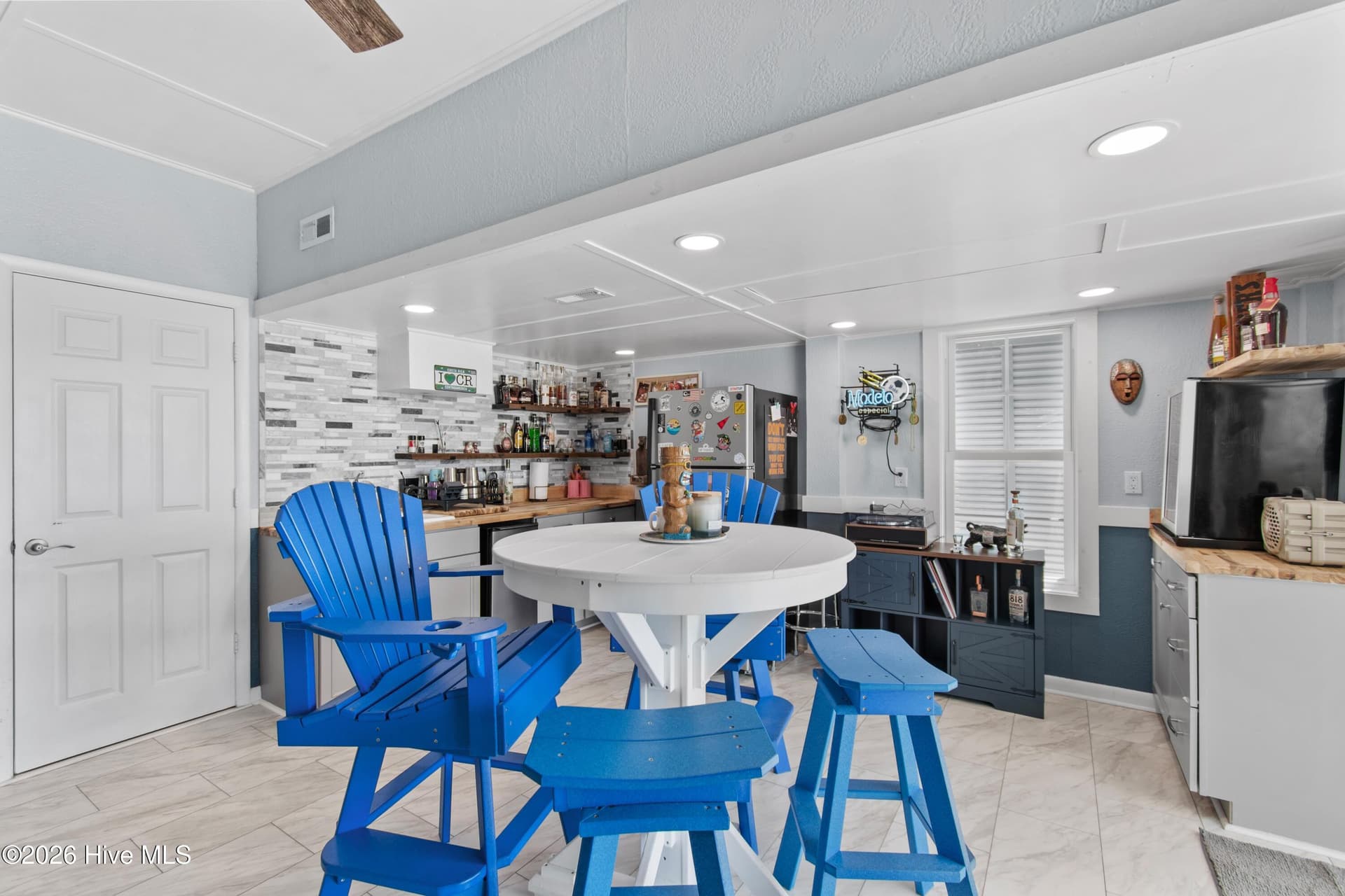 Ground floor kitchenette with seating. - 2024 Camelot Drive SW, Ocean Isle Beach, NC 28469