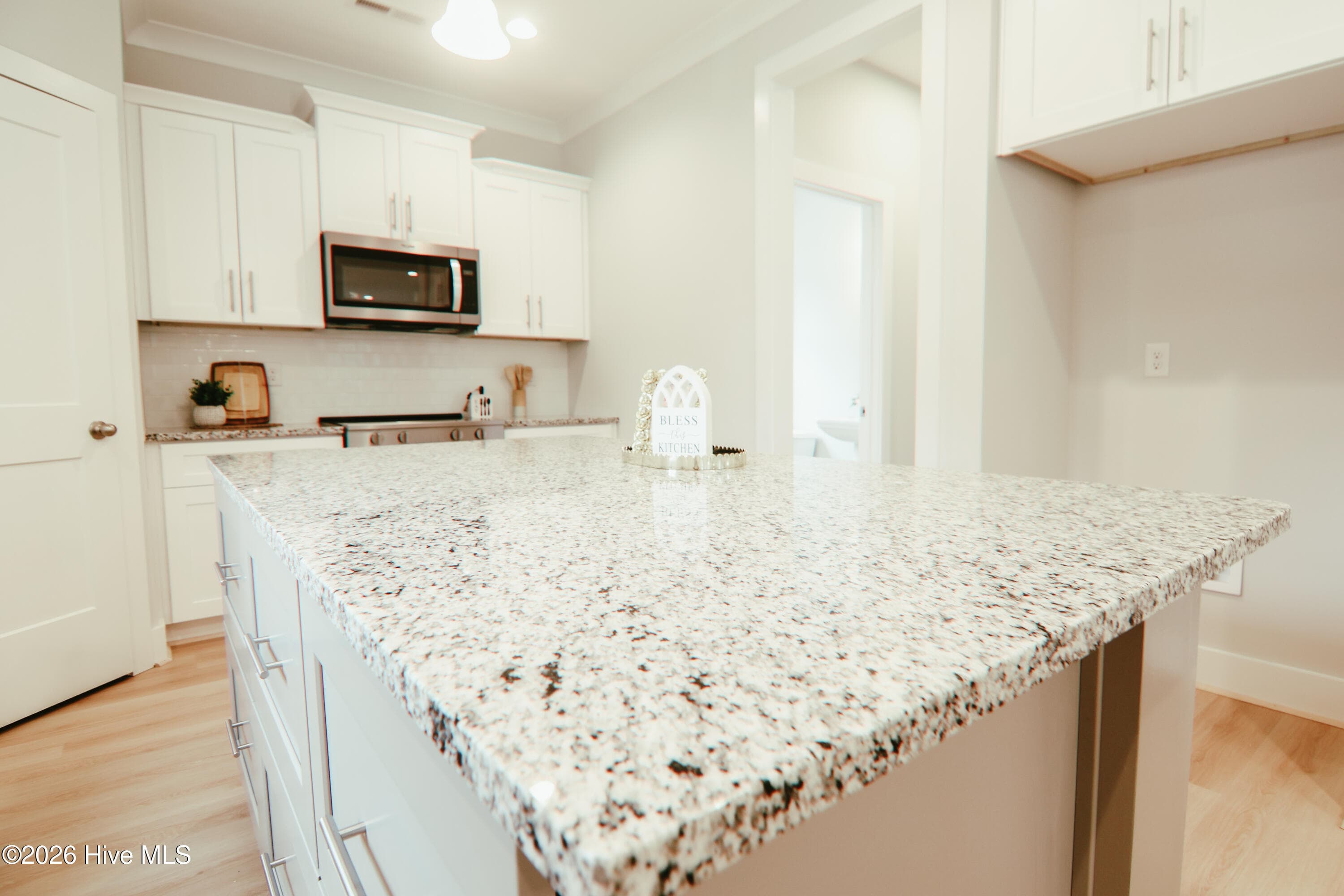Granite countertops with kitchen island - 223 Glenwood Trail, Goldsboro, NC 27534