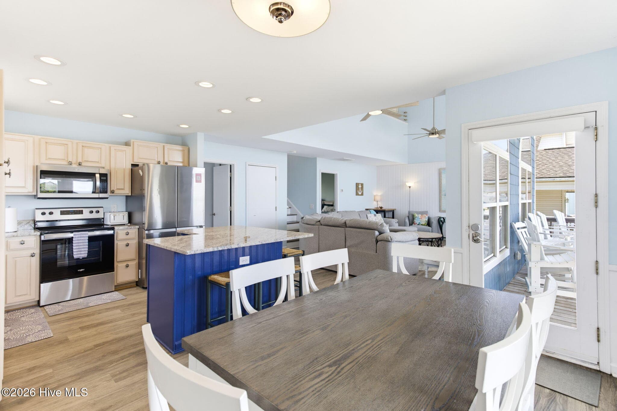 Dining area open to kitchen - 2330 W Beach Drive, Oak Island, NC 28465